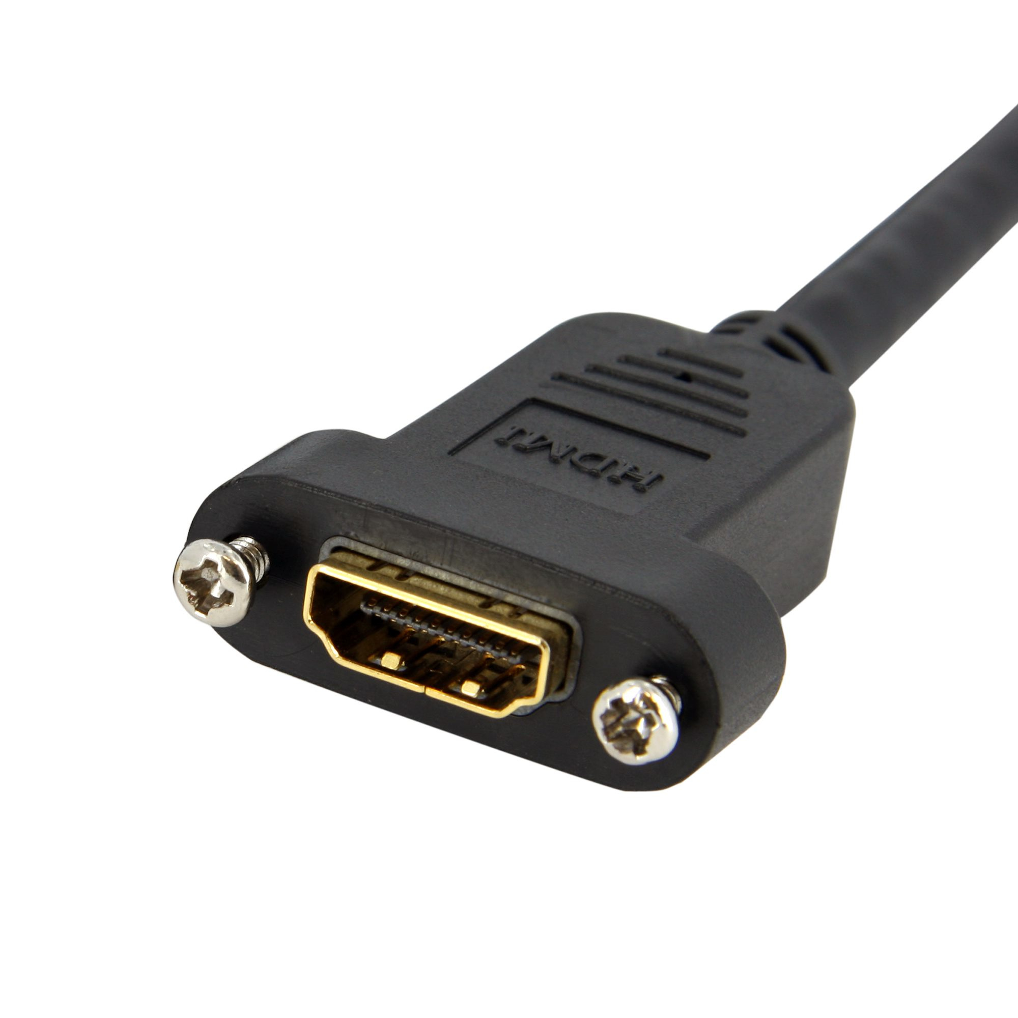 Primer plano de un conector HDMI negro con pines dorados. Dos tornillos lo aseguran. Un cable negro se extiende.