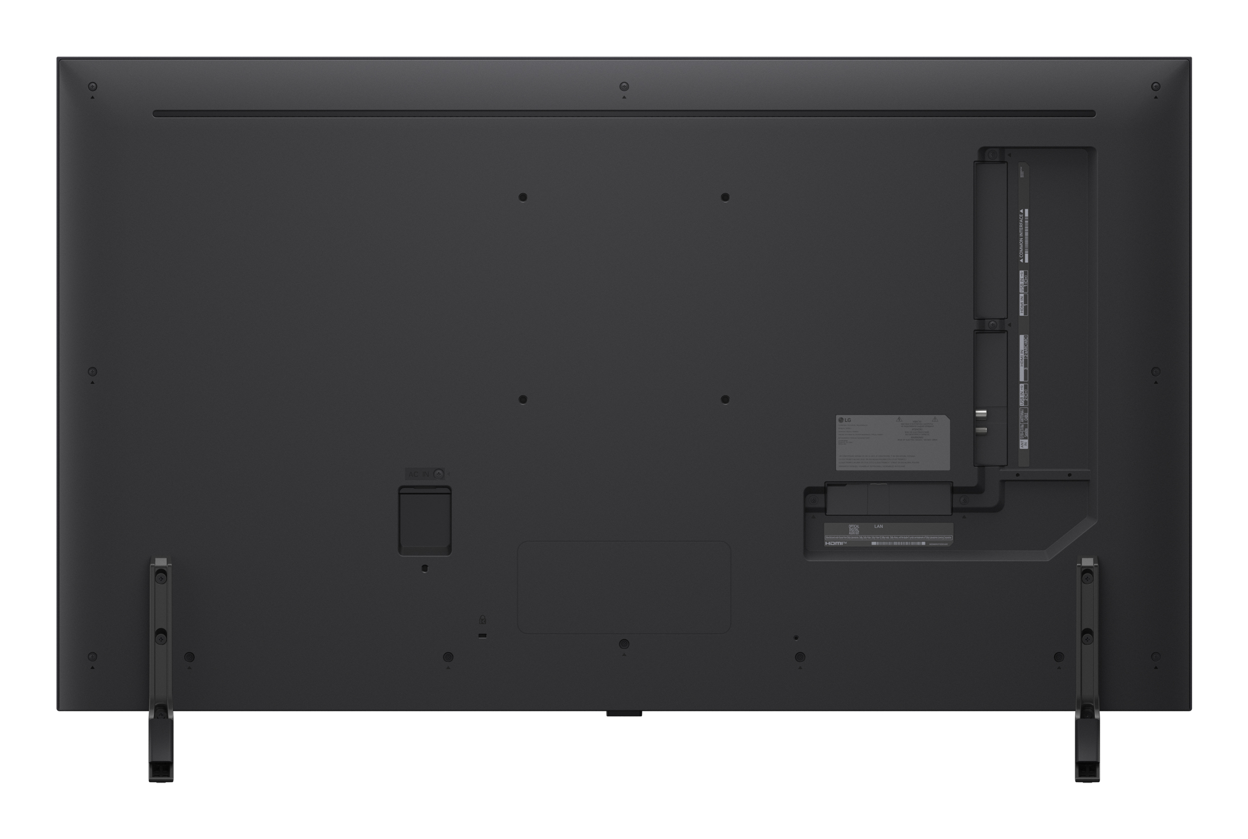 Parte trasera de un televisor LG negro. Se ven puertos, conectores y una etiqueta. Dos patas negras lo sostienen.