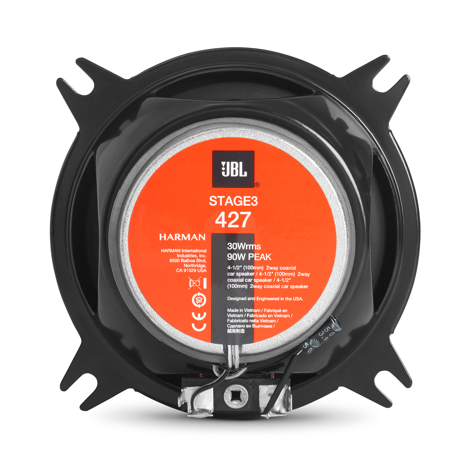 Un haut-parleur JBL Stage3 427. Il a un cadre noir, un centre orange avec du texte et un cône argenté.