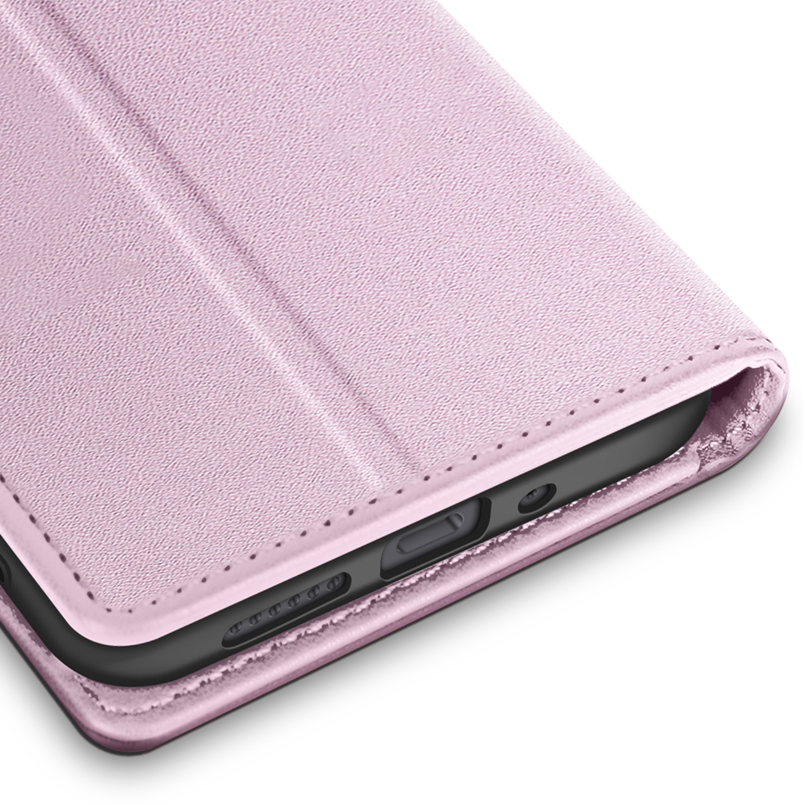 Close-up van een roze telefoonhoesje. De hoes heeft een gestructureerd oppervlak en is gedeeltelijk open.