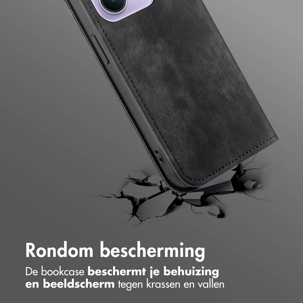 Een zwarte telefoonhoes met leertextuur. De hoes valt en de grond barst. Tekst onderaan.