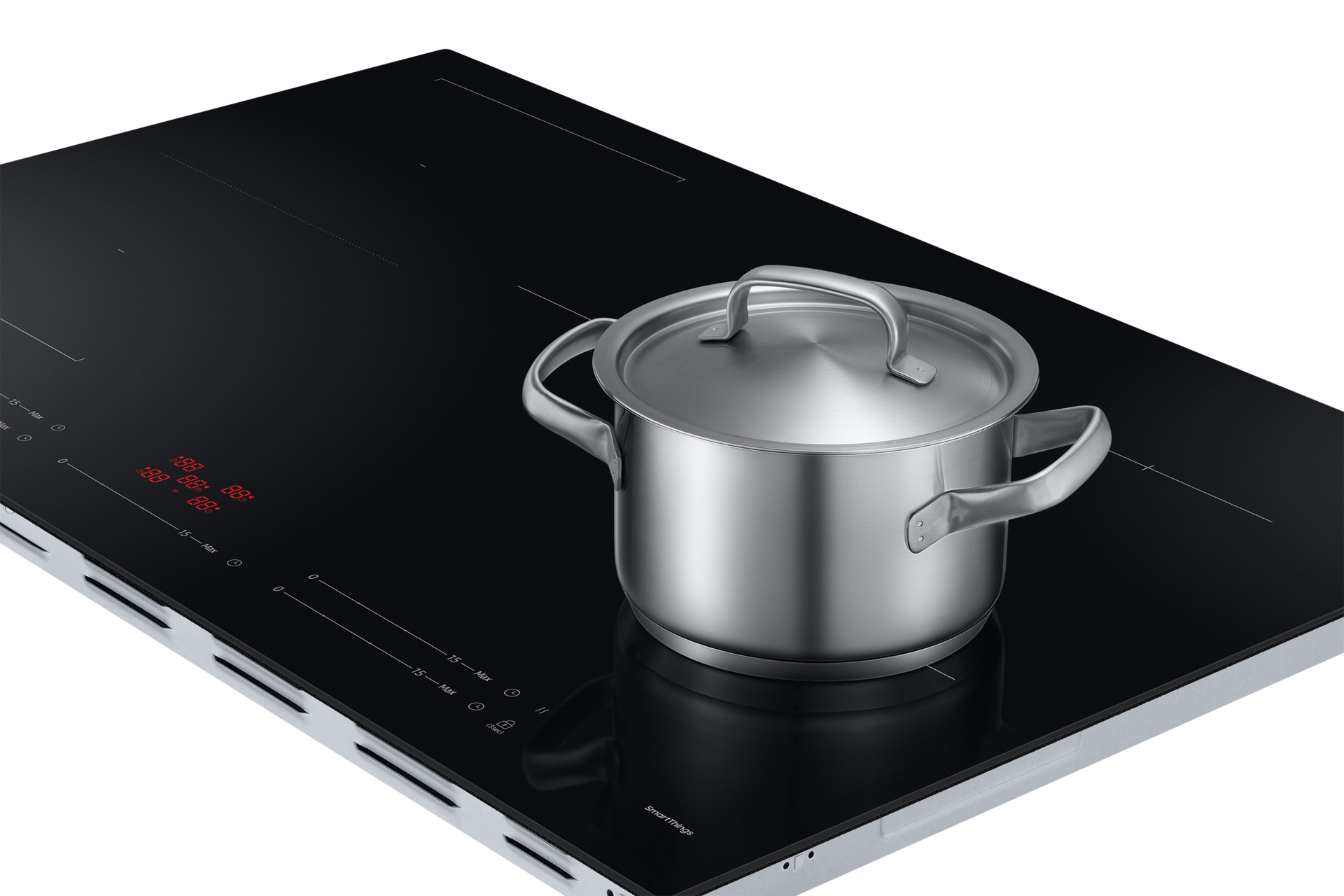 Garnek ze stali nierdzewnej z pokrywką stoi na czarnej płycie kuchennej. Płyta posiada wyświetlacze cyfrowe i oznaczenia.