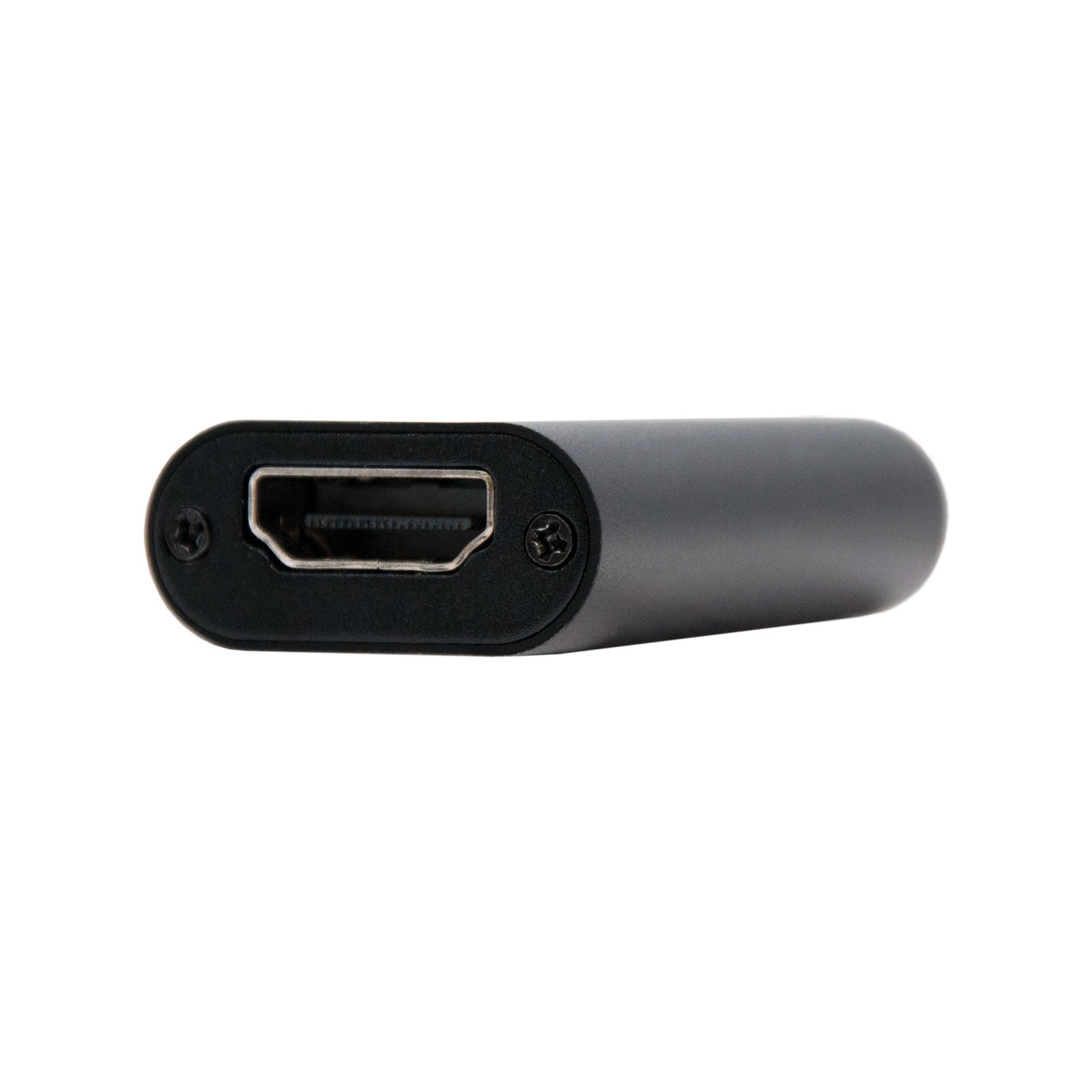 Un adaptador HDMI gris se encuentra horizontalmente sobre un fondo blanco. El puerto HDMI es visible.
