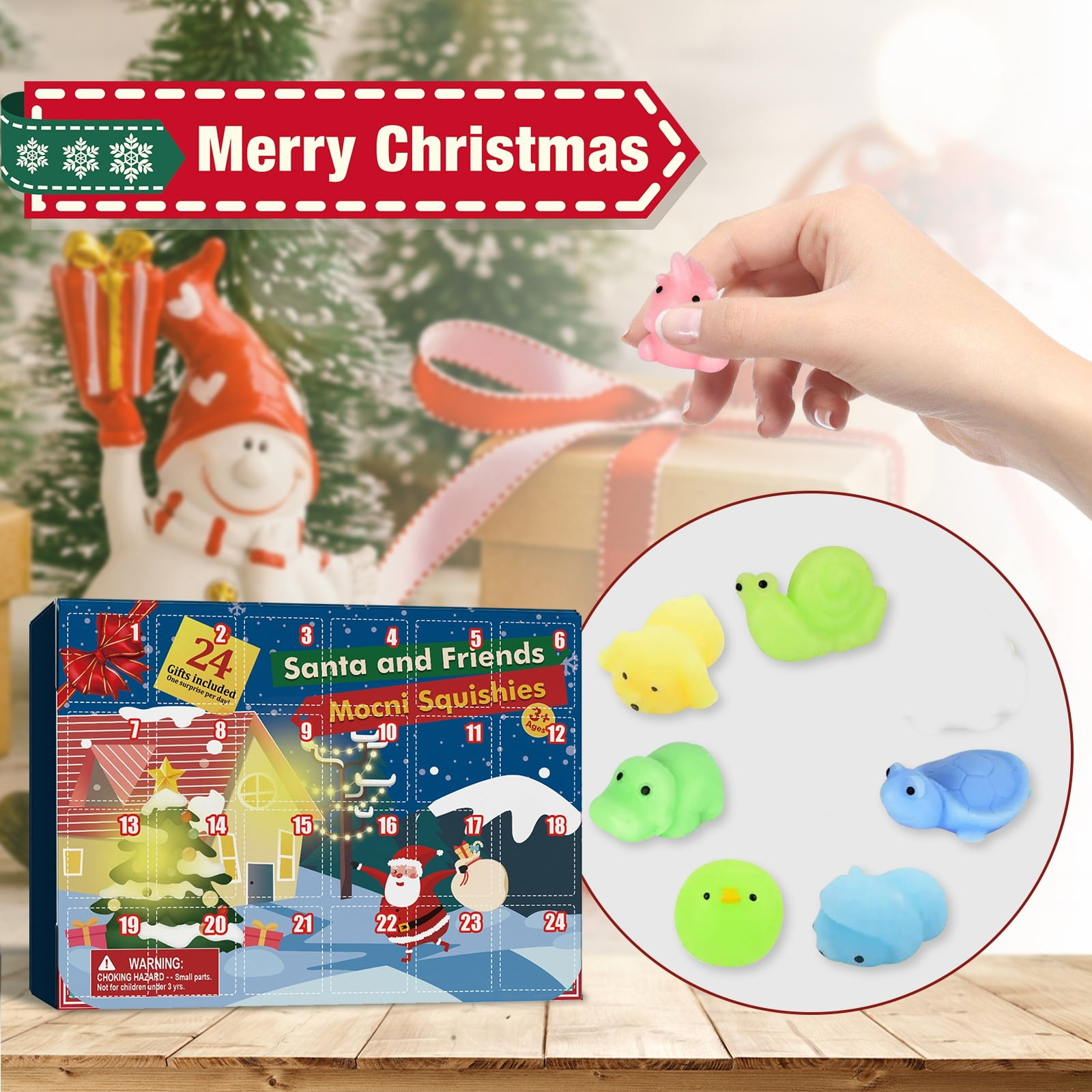 Ein Adventskalender mit Quetschies. Eine Hand hält ein rosa Schweinchen. Andere Quetschies sind sichtbar.