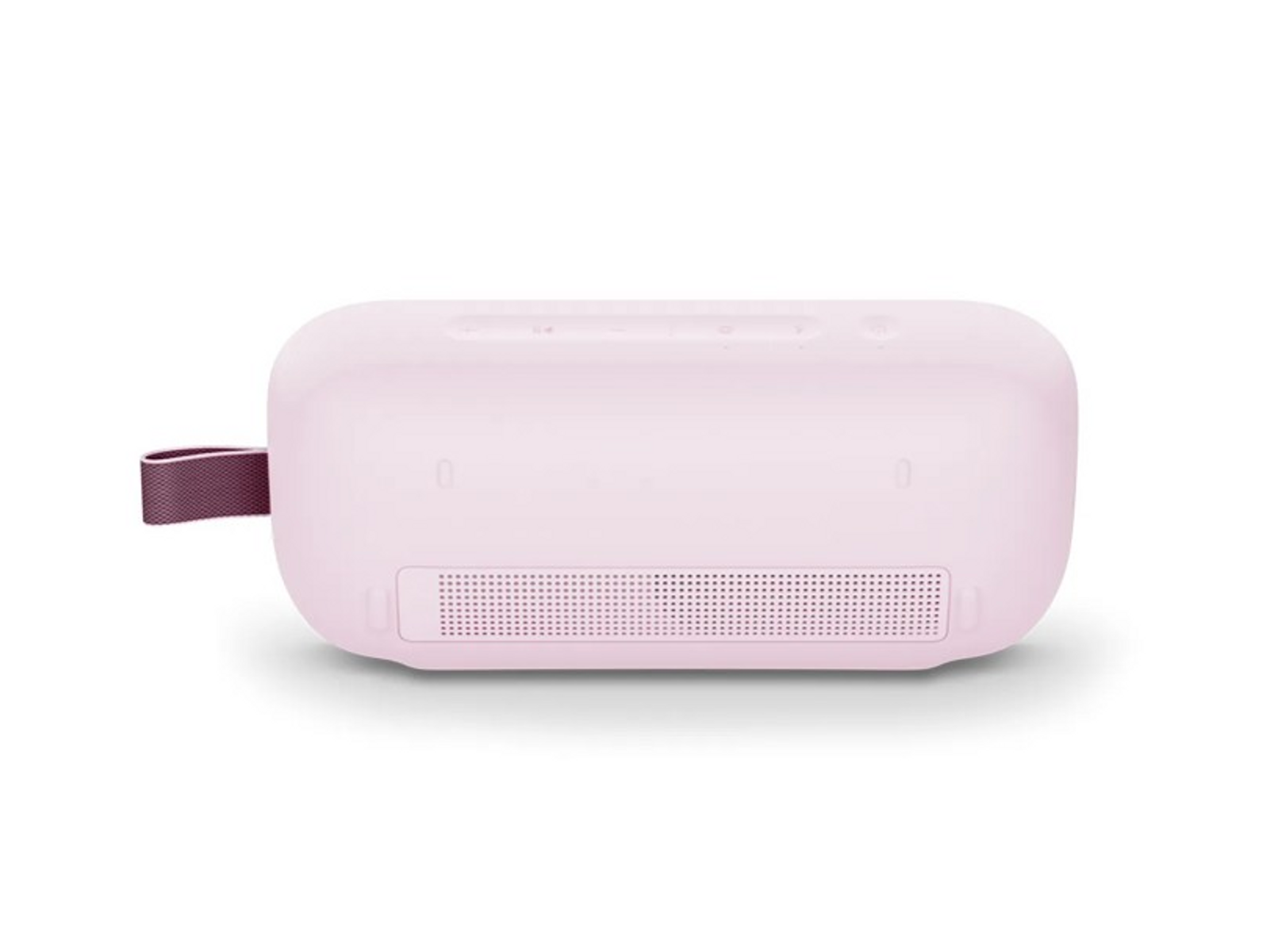 Un altavoz rosa claro con una correa burdeos. Tiene una rejilla de altavoz, botones y un puerto. Fondo blanco.