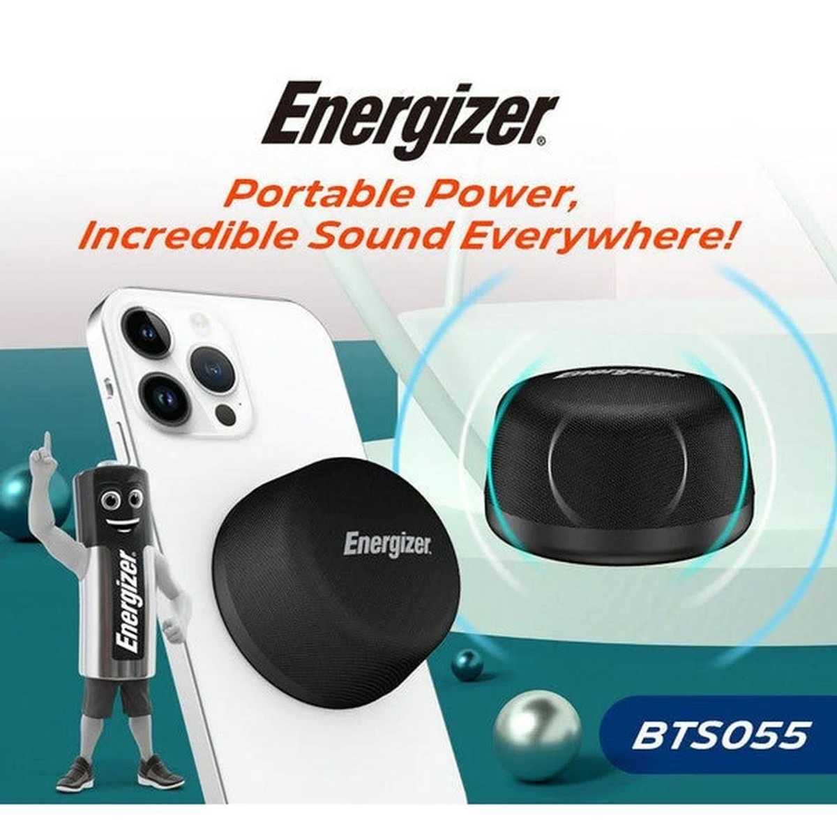 Una pubblicità Energizer. Un telefono con un altoparlante Energizer, una figura di batteria a cartoni animati e un altoparlante. Testo: Energia portatile.