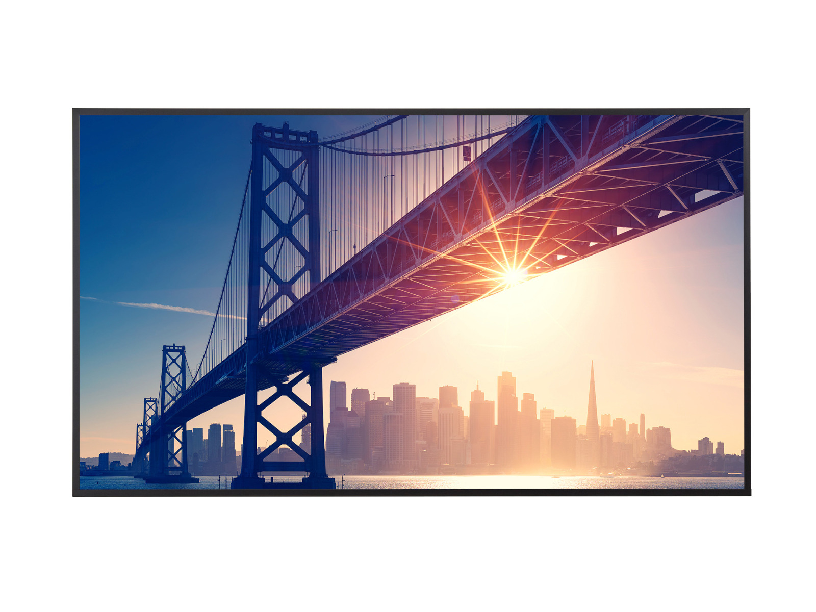 Il Bay Bridge si estende sullo skyline, il sole splende, con la sagoma della città sullo sfondo.