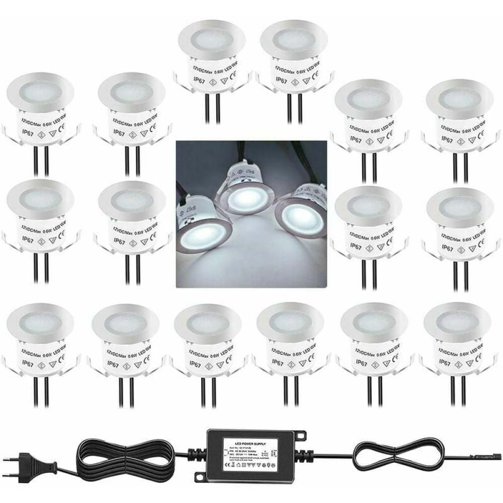 Ein Satz LED-Leuchten. Sie sind weiß und kreisförmig, mit schwarzen Drähten und einem Netzteil. Die Lichter sind in Reihen.