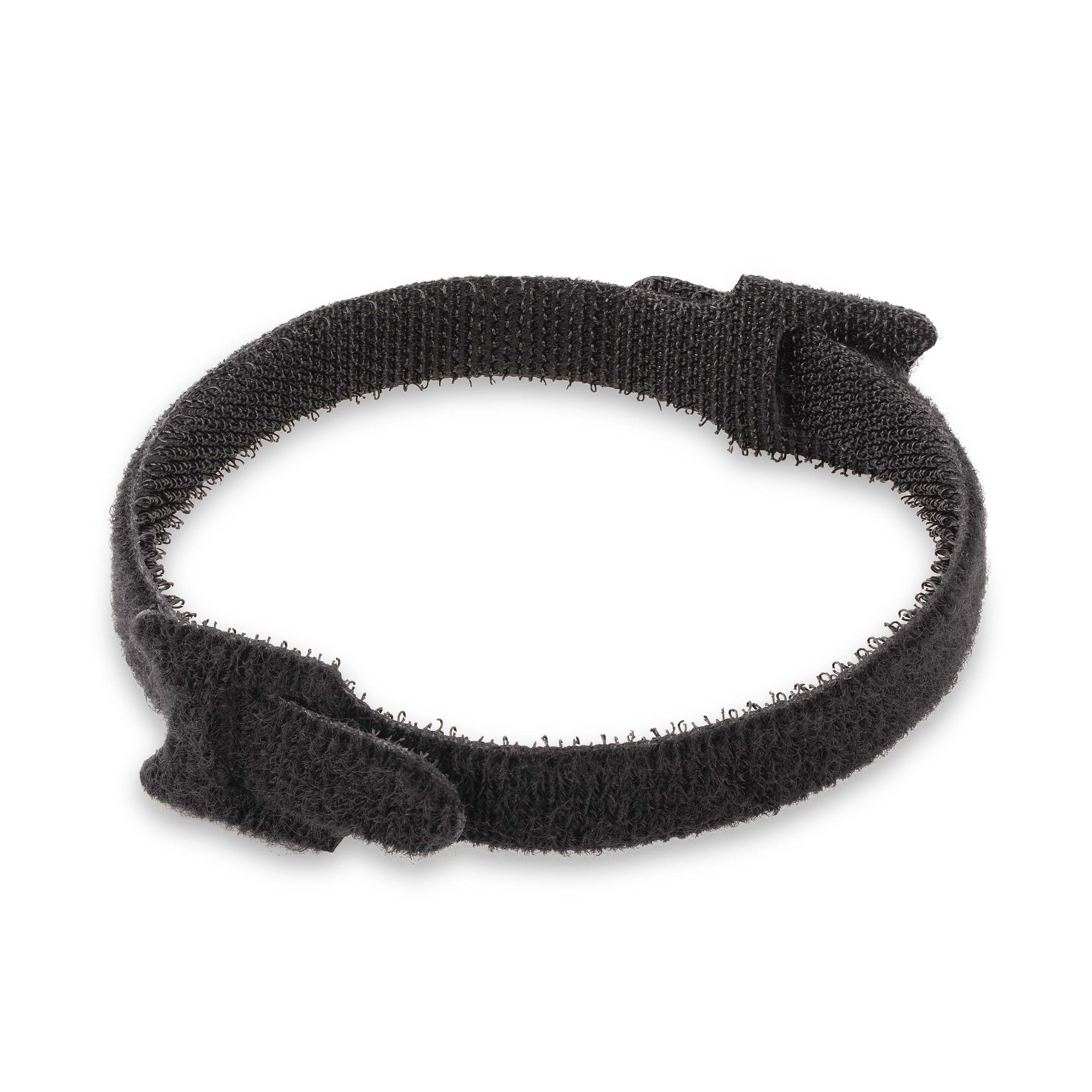 Un cinturino nero a strappo è mostrato su sfondo bianco. Ha una forma circolare.