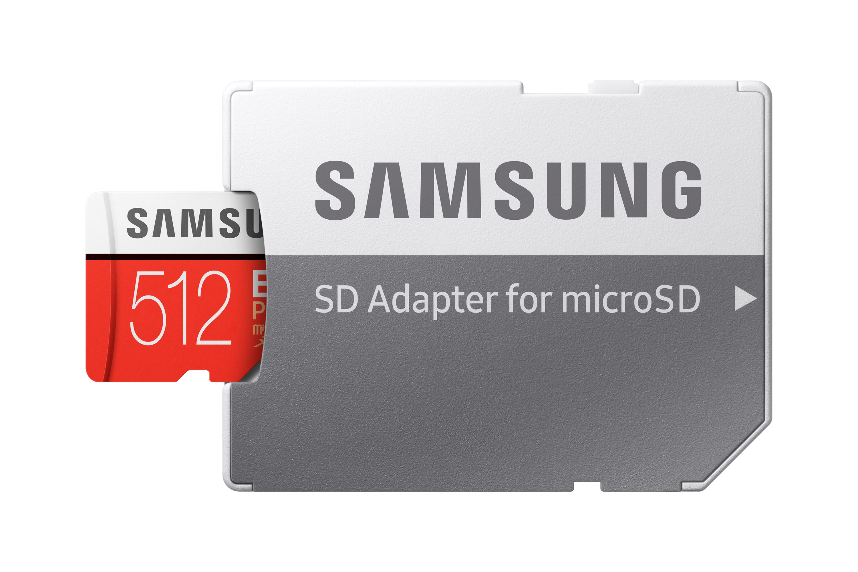 Adaptateur de carte SD Samsung. Blanc et gris, avec logo Samsung. Carte microSD rouge insérée.