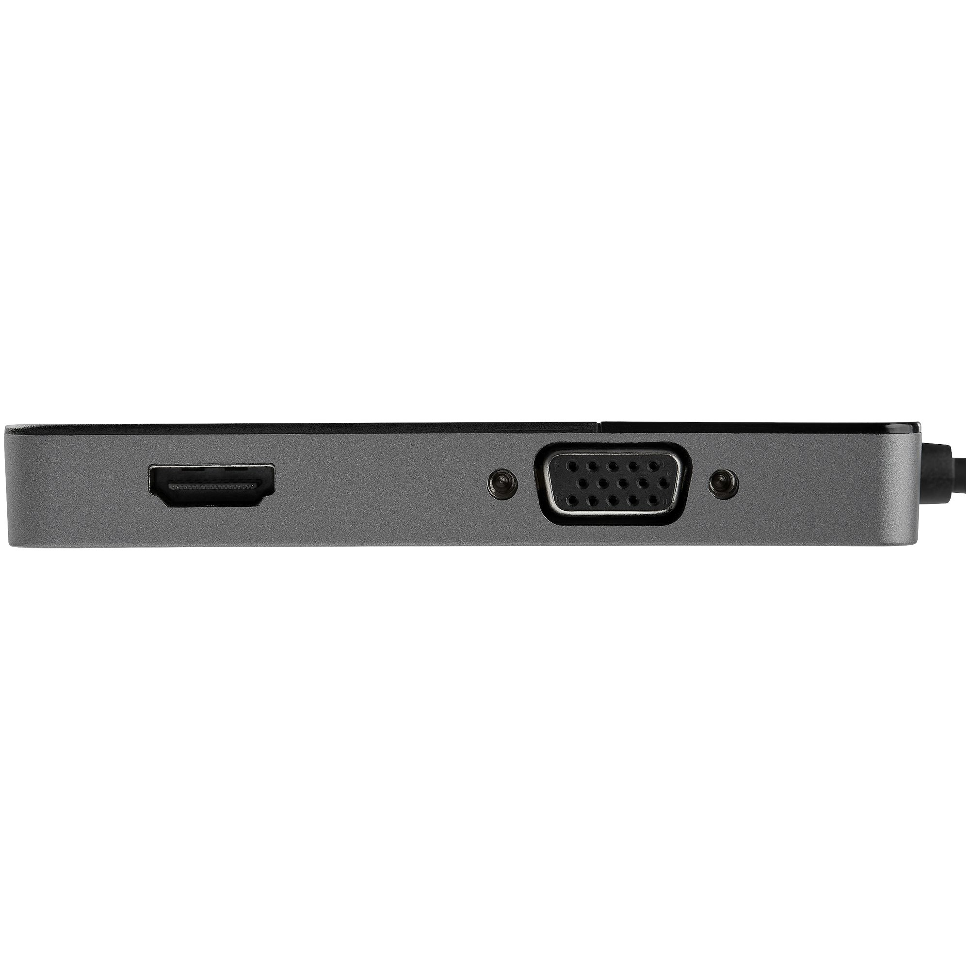 Un adaptador multipuerto gris con un puerto HDMI, un puerto VGA y un cable de alimentación sobre fondo blanco.