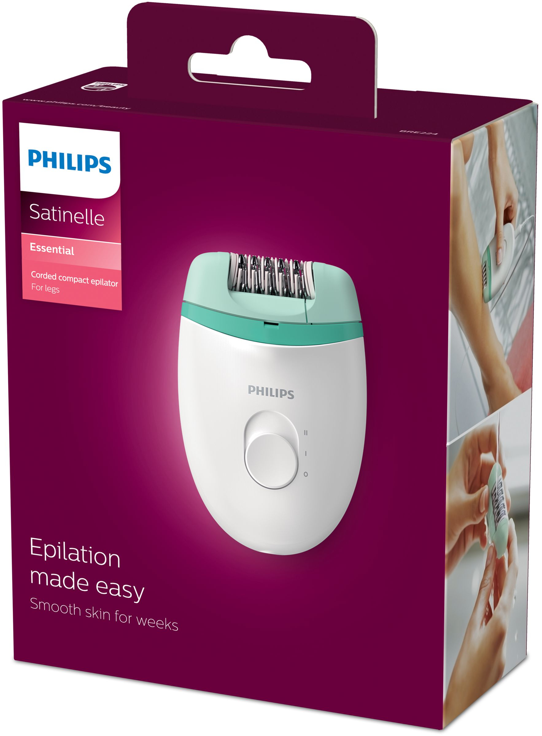 Caja del depilador Philips con el dispositivo. Depiladora blanca y verde azulado sobre fondo morado. Usada por mujer.