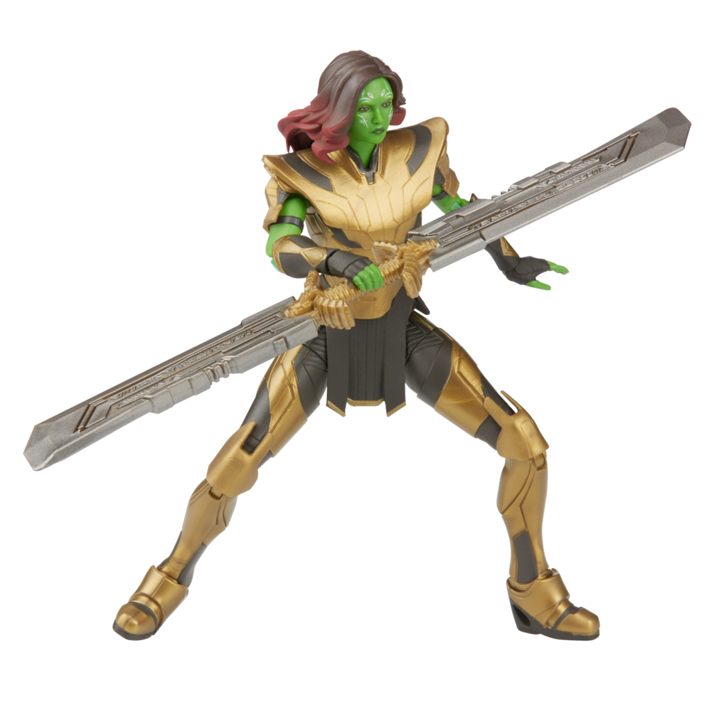 Una figura de acción de Gamora con armadura dorada y negra y una gran espada plateada. Tiene piel verde y cabello castaño.