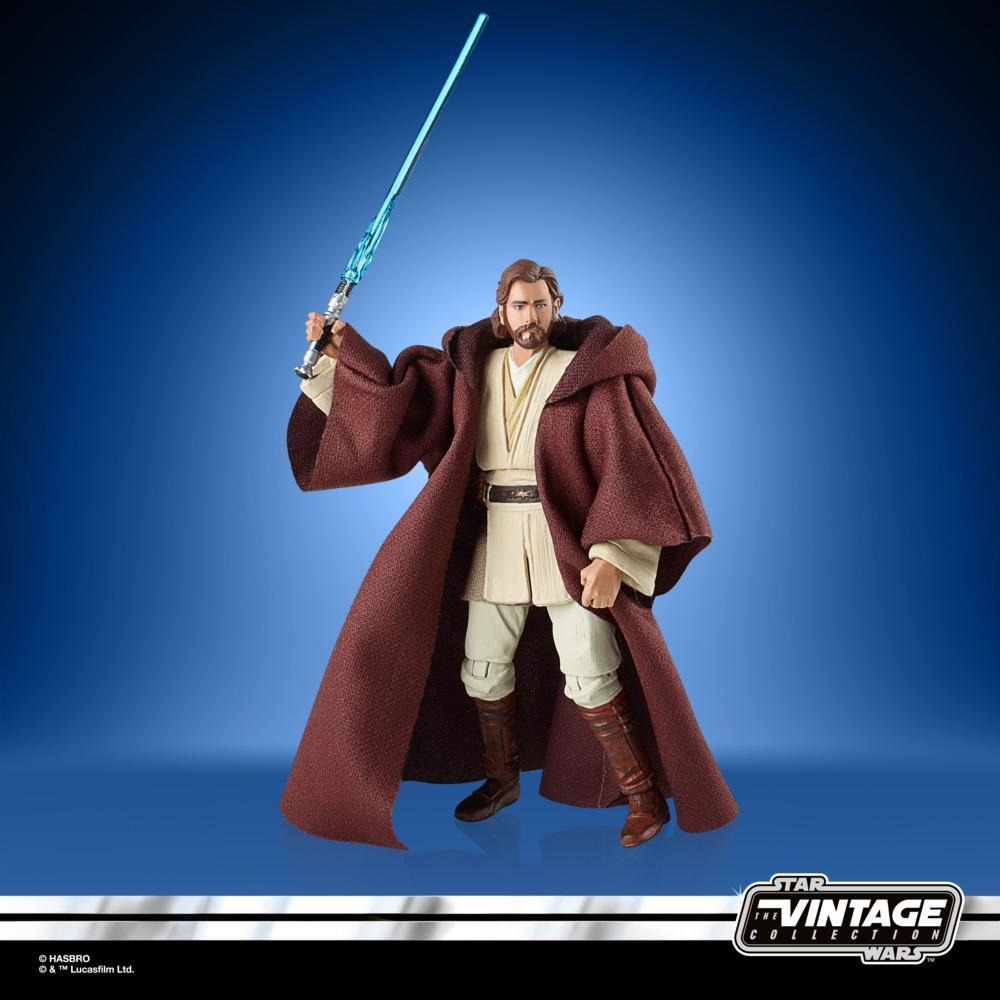 Figura di Obi-Wan Kenobi in abito marrone, con una spada laser blu. Logo Star Wars Vintage Collection.