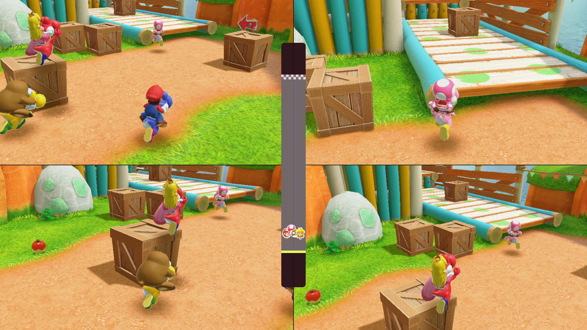 Mario und andere Zeichentrickfiguren laufen um Holzkisten in einer farbenfrohen Umgebung im Freien herum. Eine rosa Figur rennt auf einer Brücke.