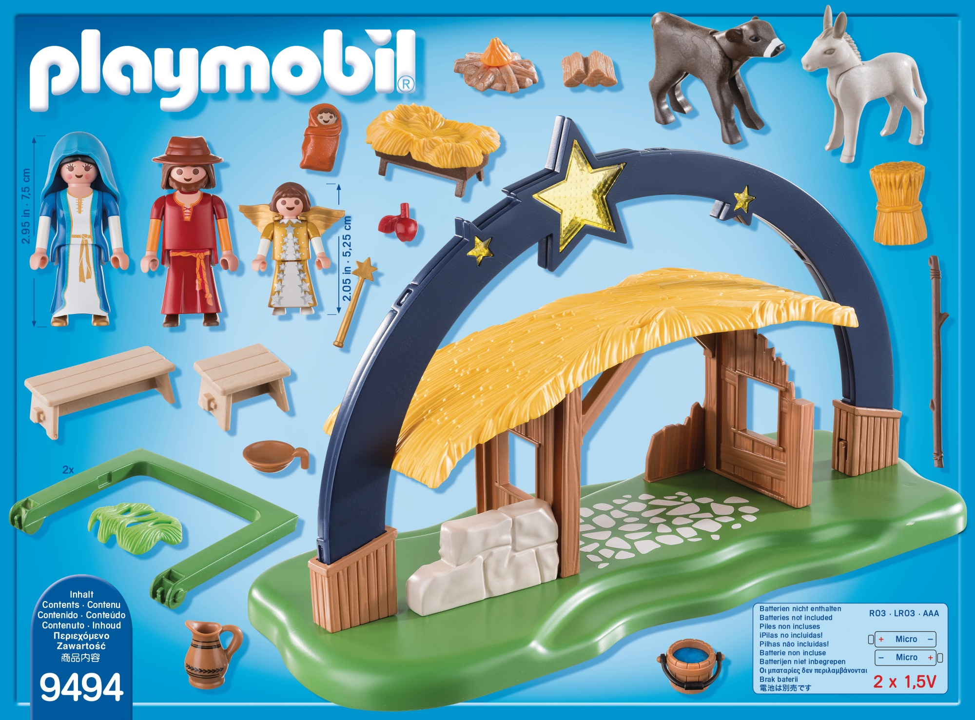 Set Playmobil presepe con personaggi, animali e una stalla sotto un arco a forma di stella.