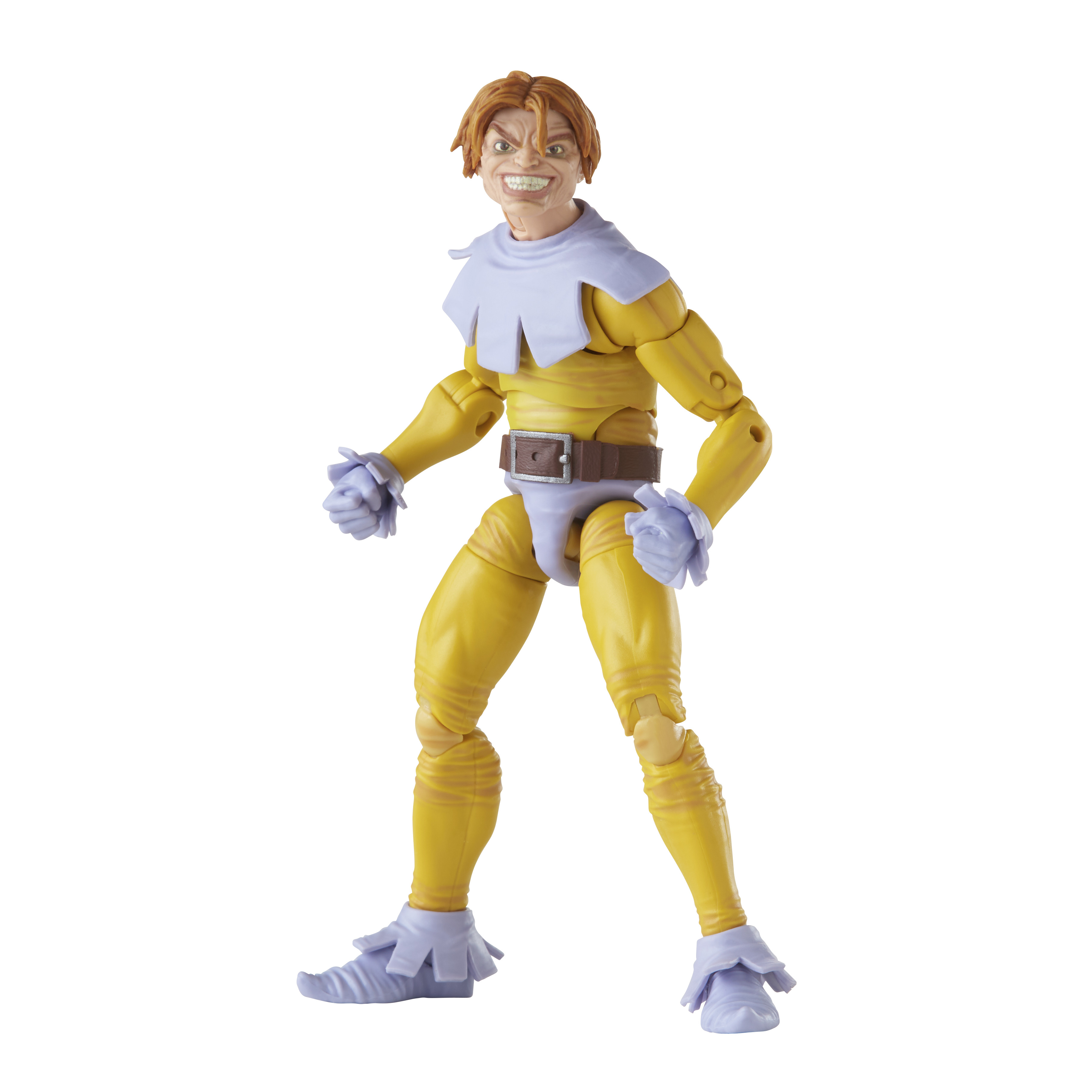Action figure gialla con sorriso minaccioso, colletto, guanti e scarpe azzurri, cintura marrone.