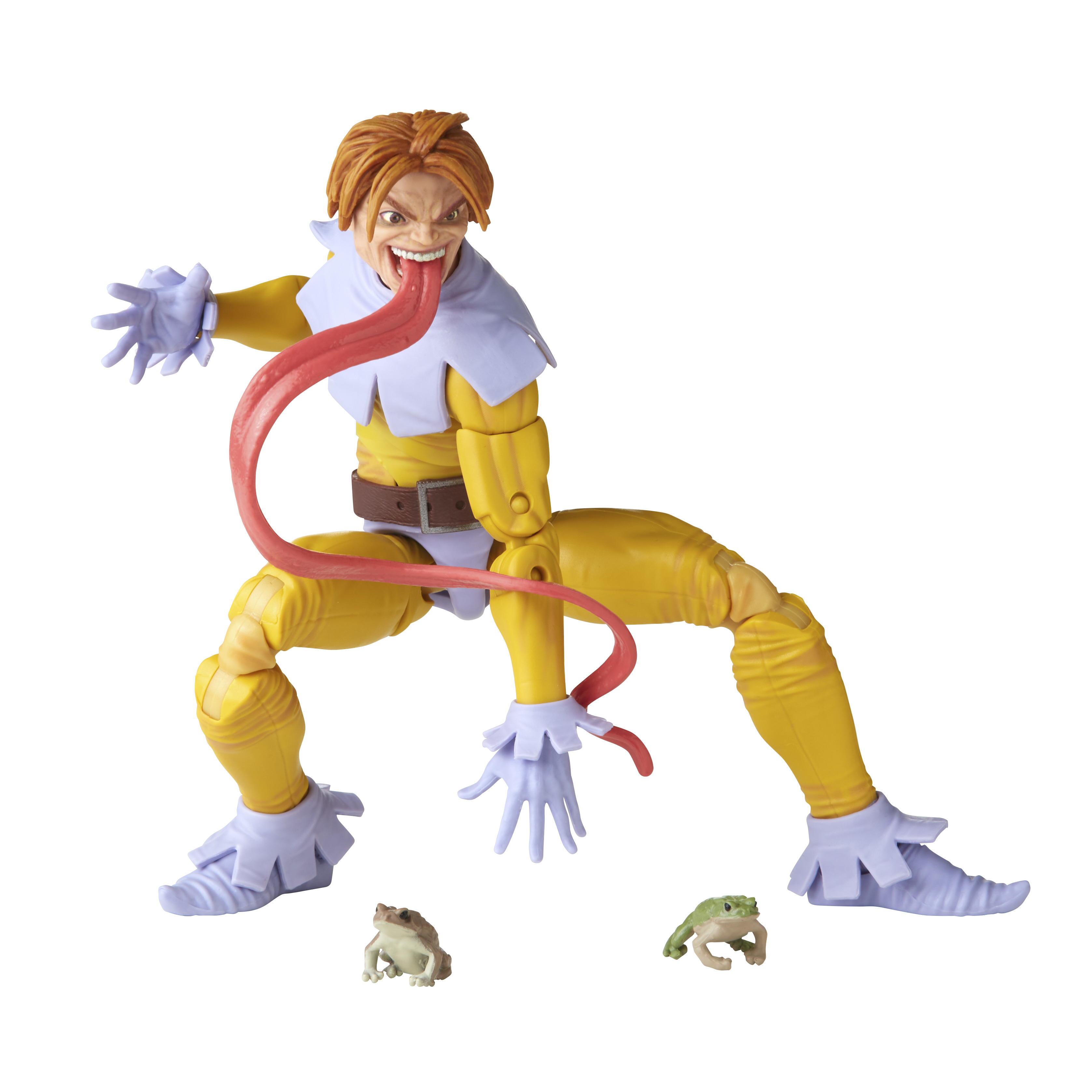 Action figure di un uomo con la lingua estesa, in tuta gialla, con due piccole figure di rana. Sfondo bianco.
