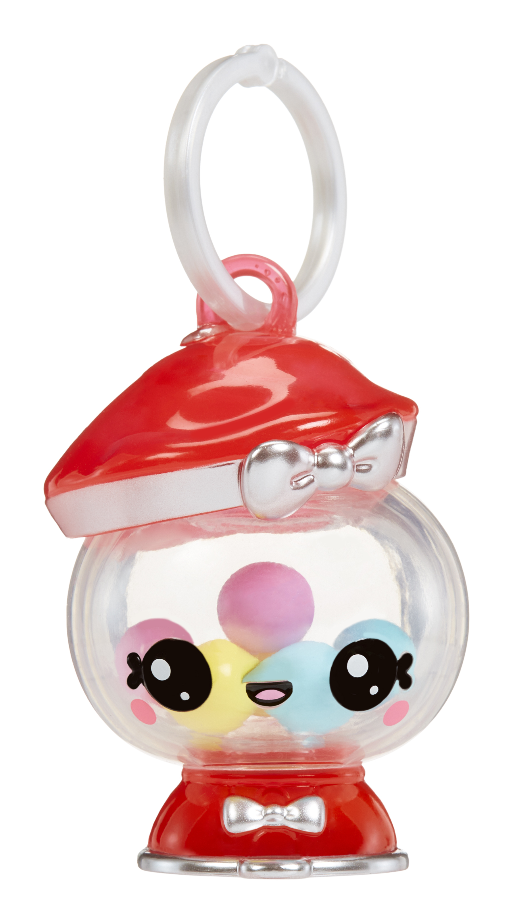 Zabawkowa maszyna do gumy do żucia z czerwonym kapeluszem i kokardą. Przezroczysta kula ma kolorowe gumy do żucia i twarz z kreskówki.