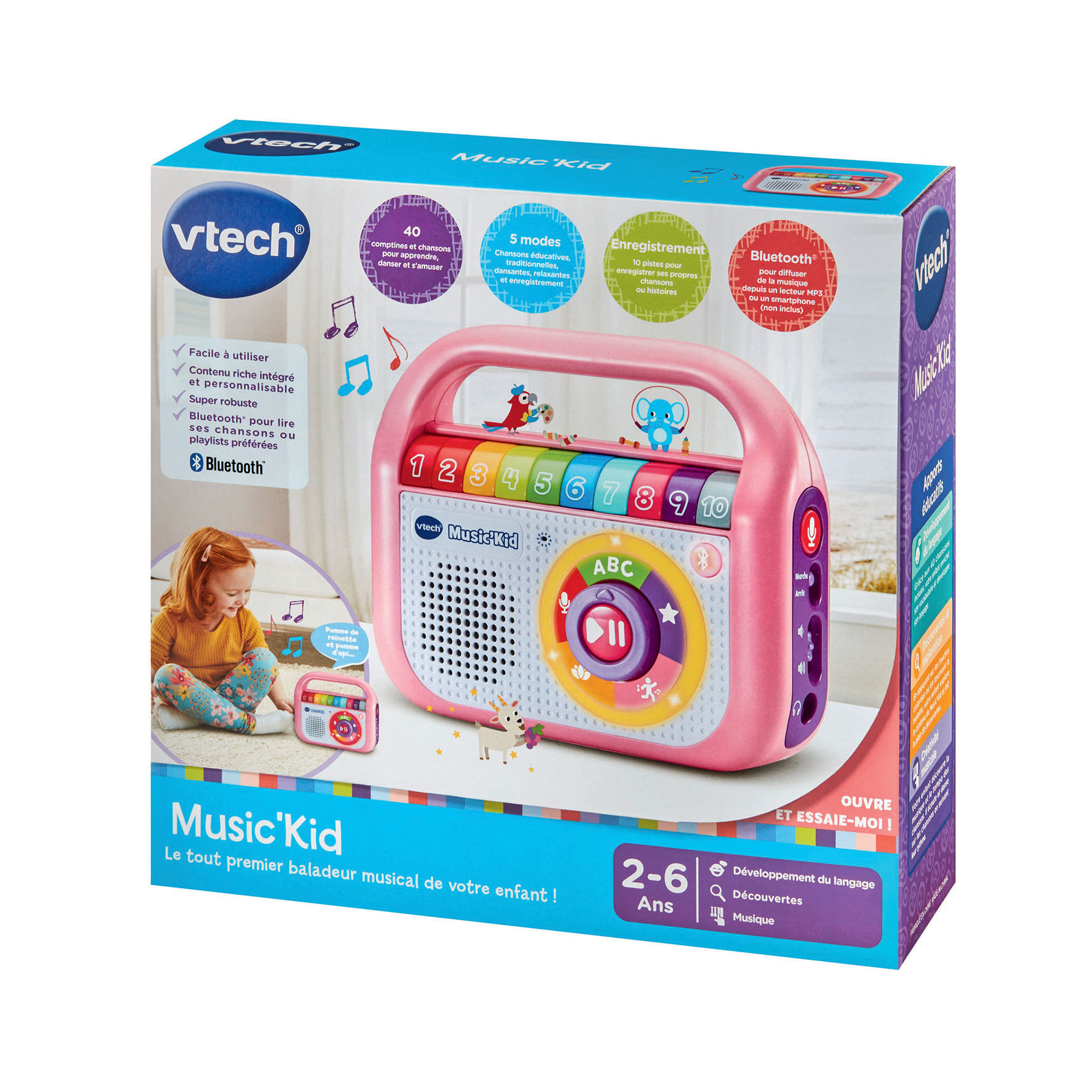 Eine rosa VTech Music Kid Spielzeugkiste. Sie hat einen Griff, bunte Knöpfe und Illustrationen. Ein Kind wird bei der Benutzung gezeigt.