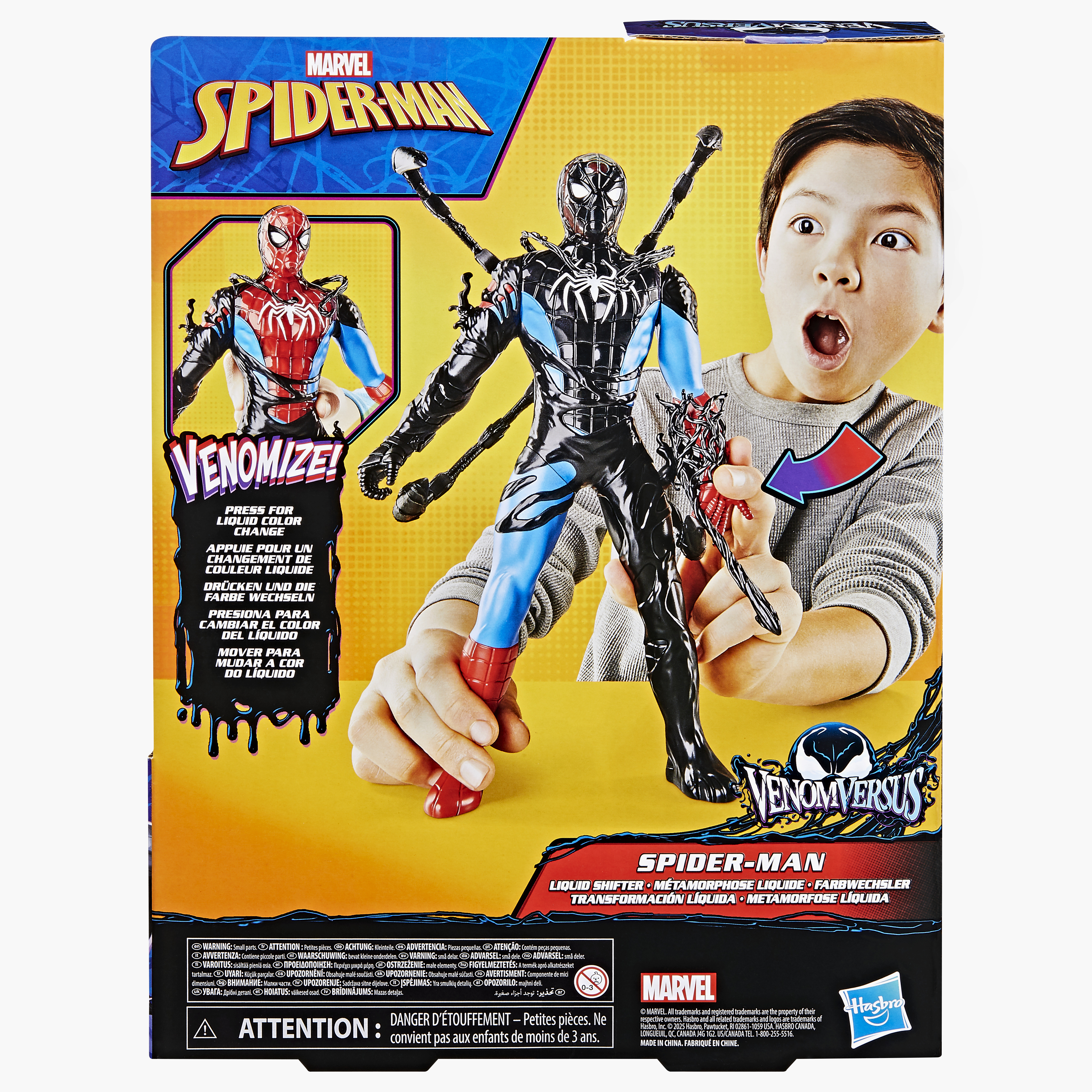 La caja muestra una figura de Spider-Man sostenida por un niño. La figura es negra y azul. El niño está sorprendido.