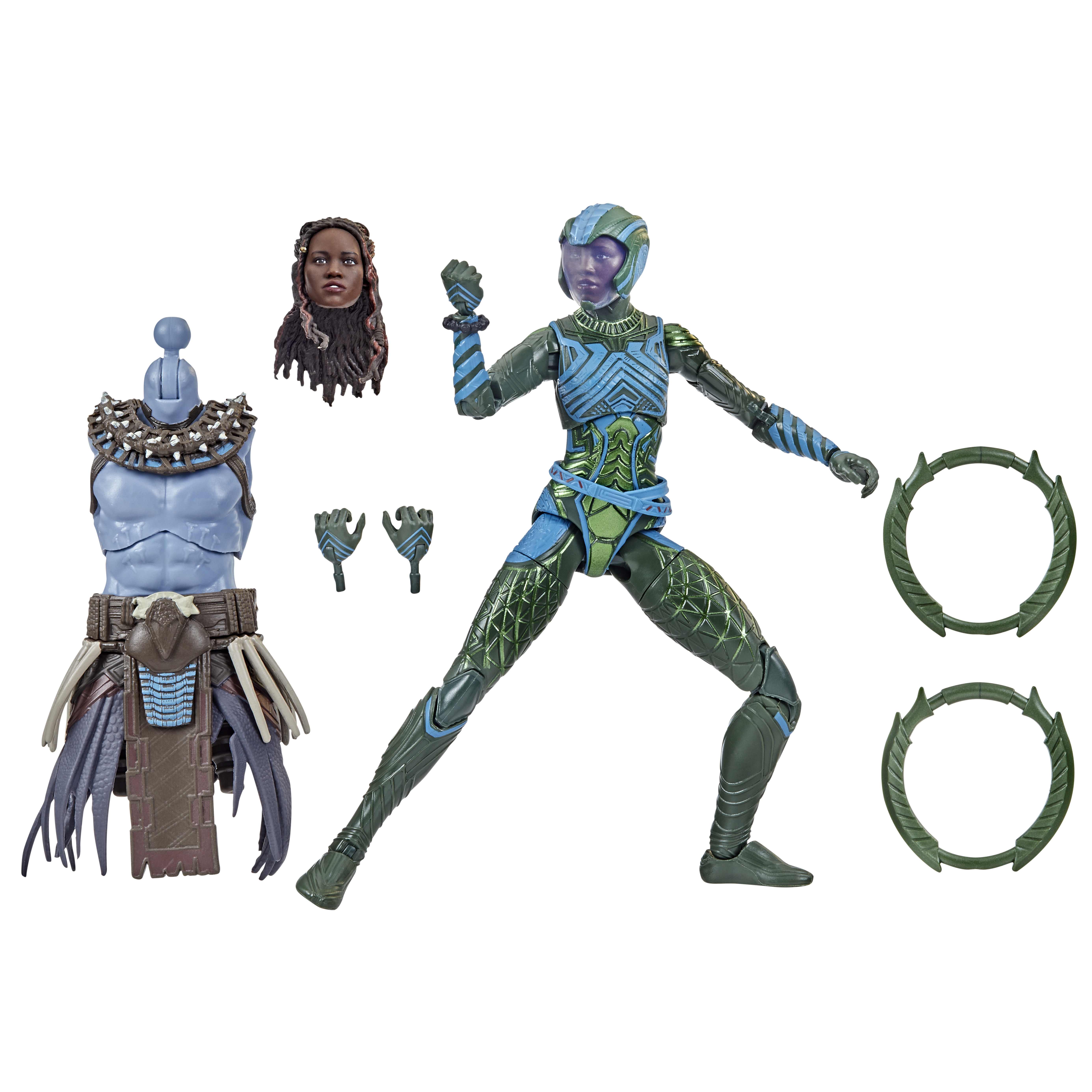 Figurka akcji z wymiennymi częściami. Zawiera figurę kobiety, tułów, głowę, dłonie i dwie okrągłe bronie. Zielony i niebieski.