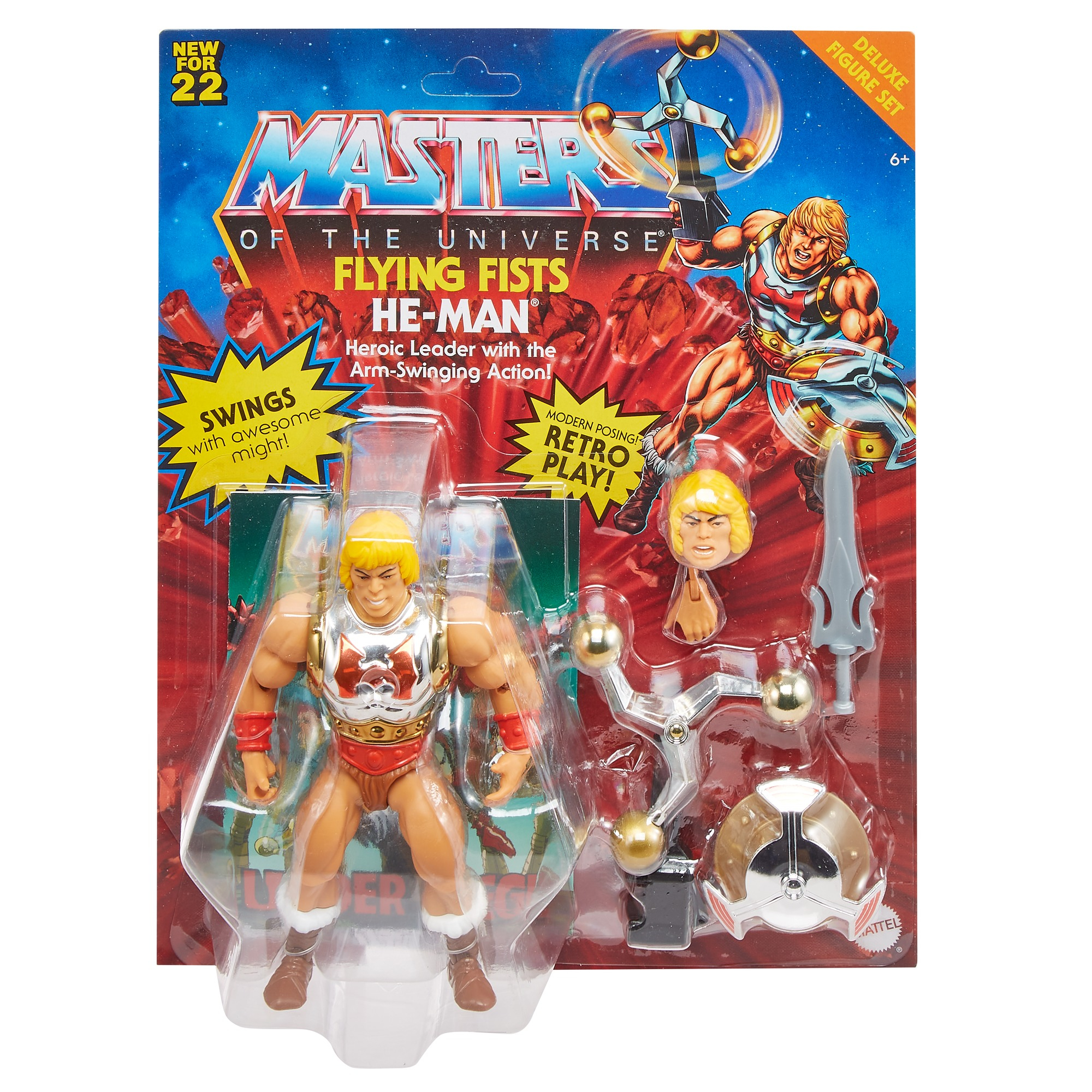 Action figure di He-Man nella confezione. La confezione mostra He-Man con accessori. Il testo include 'Flying Fists' e 'Retro Play'.