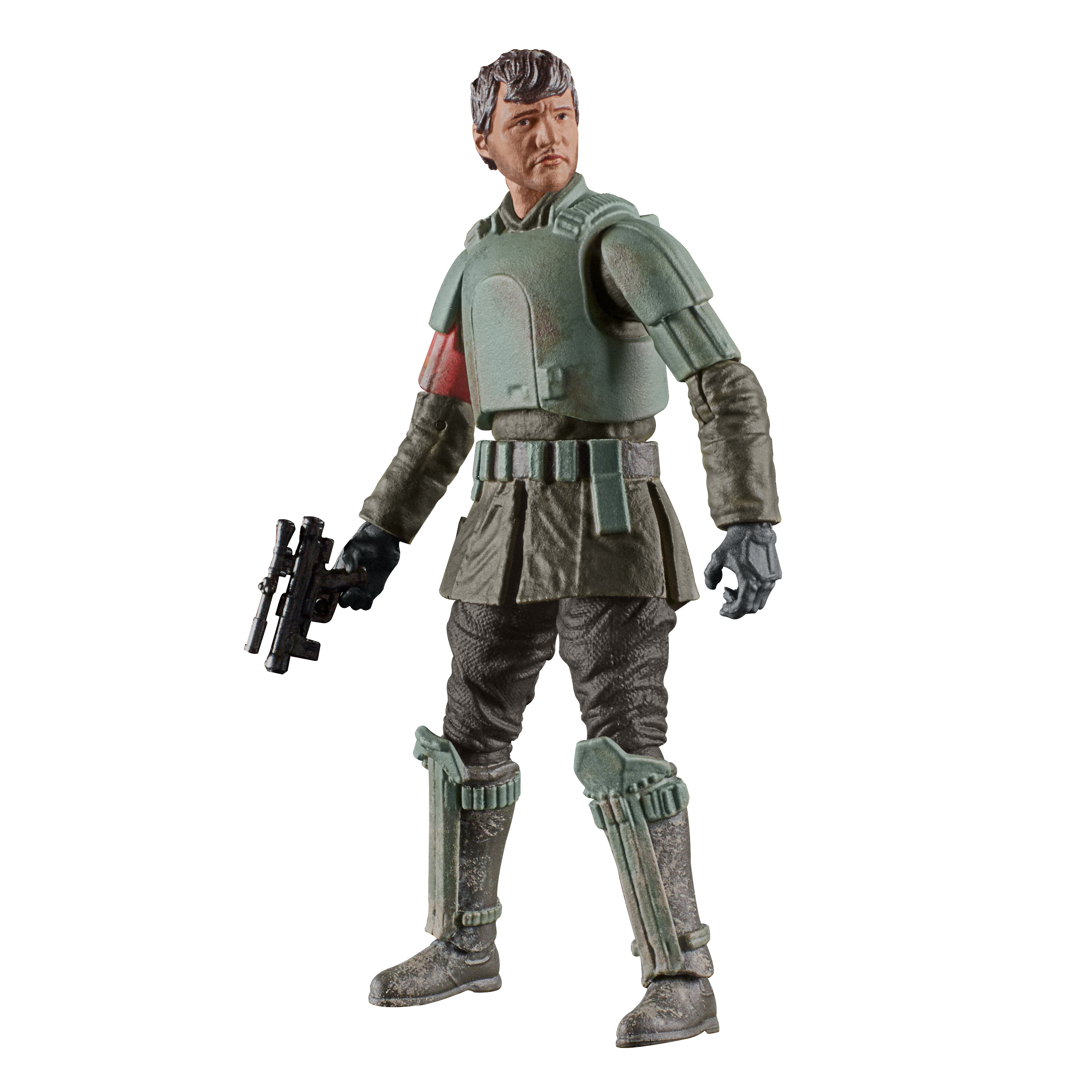 Action figure di un uomo in armatura verde, con una pistola nera. Ha un bracciale rosso e guarda di lato.