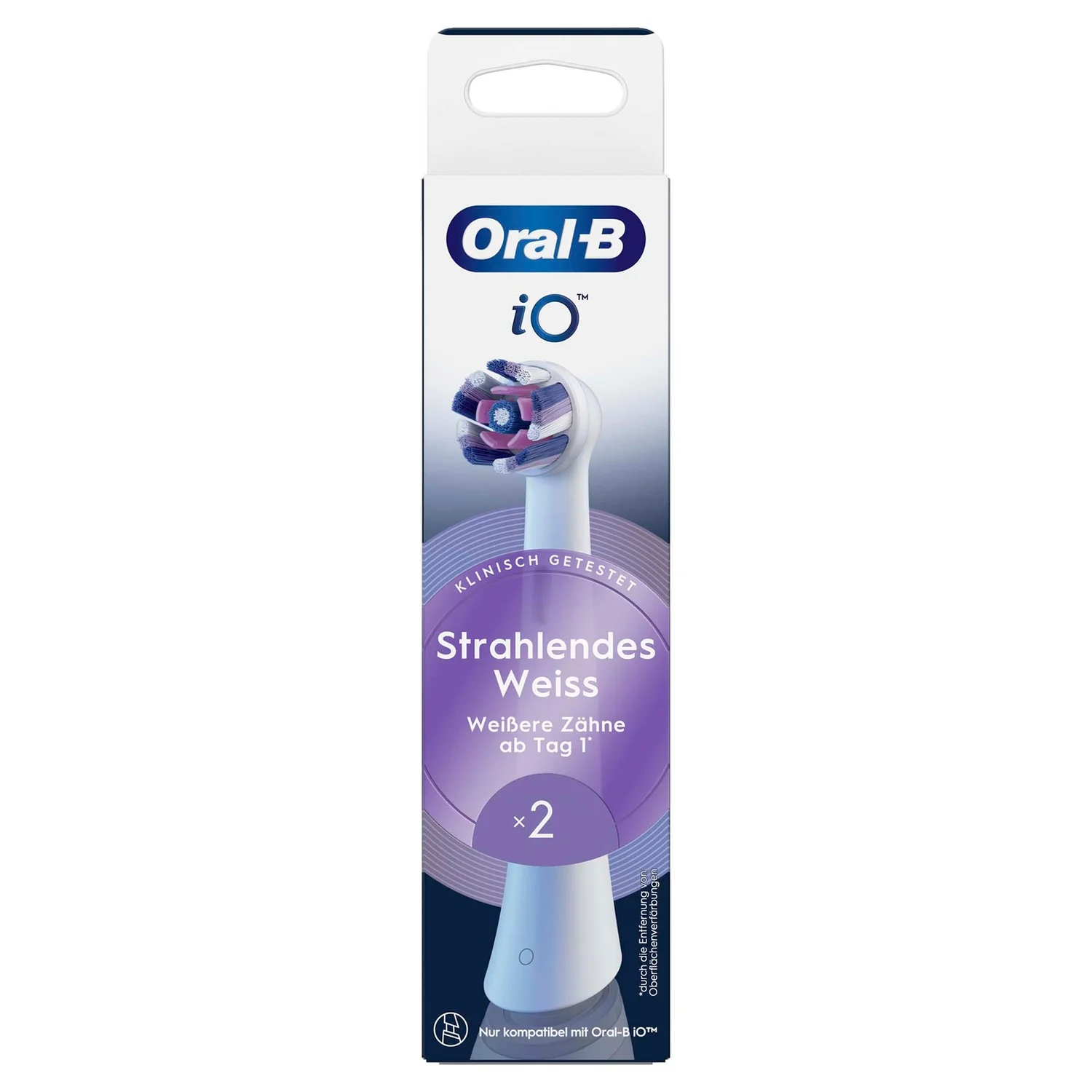 Eine Packung Oral-B iO Zahnbürstenköpfe. Die Verpackung ist weiß mit lila Akzenten. Sie wirbt für weißere Zähne und hat 'x2' darauf.
