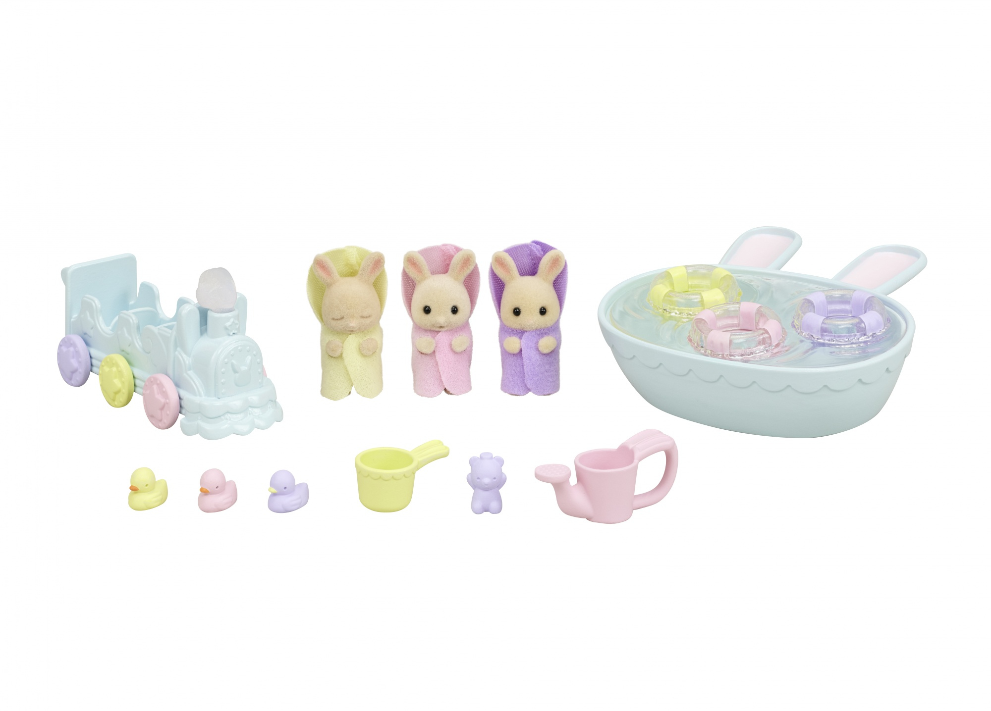 Un juego de juguetes con conejos, patos, un tren, una bañera con anillos y otros accesorios en colores pastel.