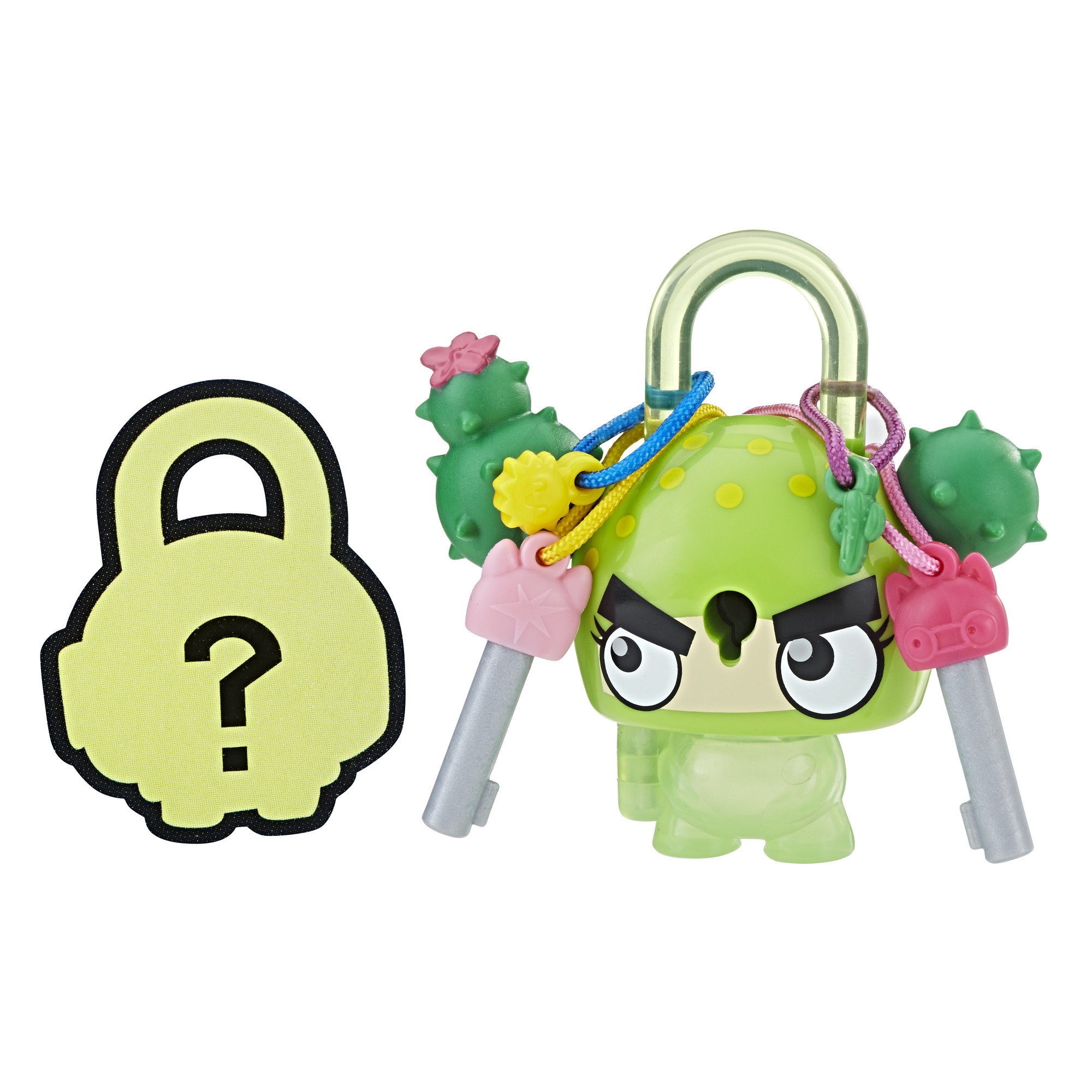 Un giocattolo verde a forma di lucchetto con chiavi e un punto interrogativo. Il giocattolo ha un design a lucchetto con un volto e vari accessori per chiavi.