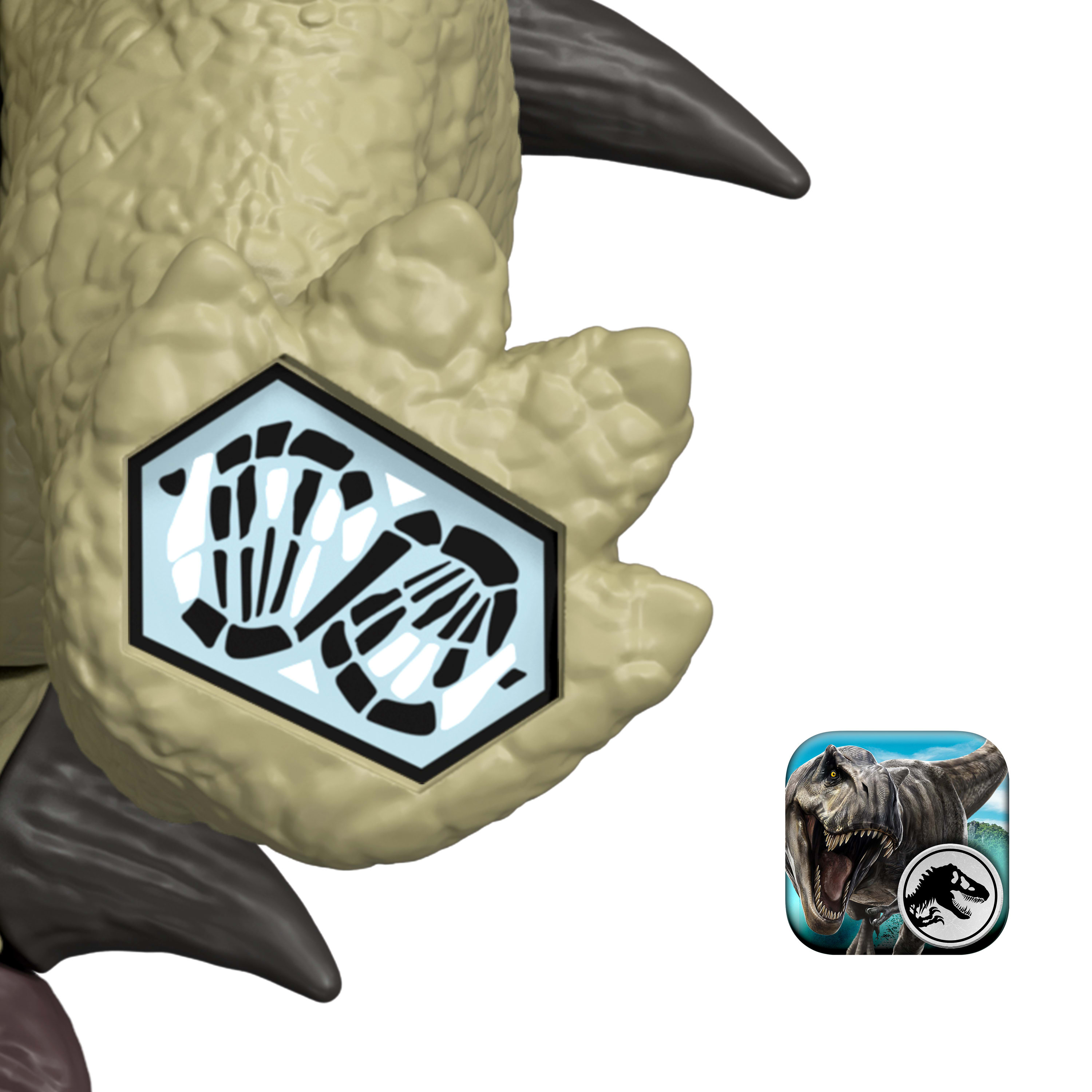 Pazur zabawki dinozaura z kodem QR i ikoną aplikacji Jurassic World.