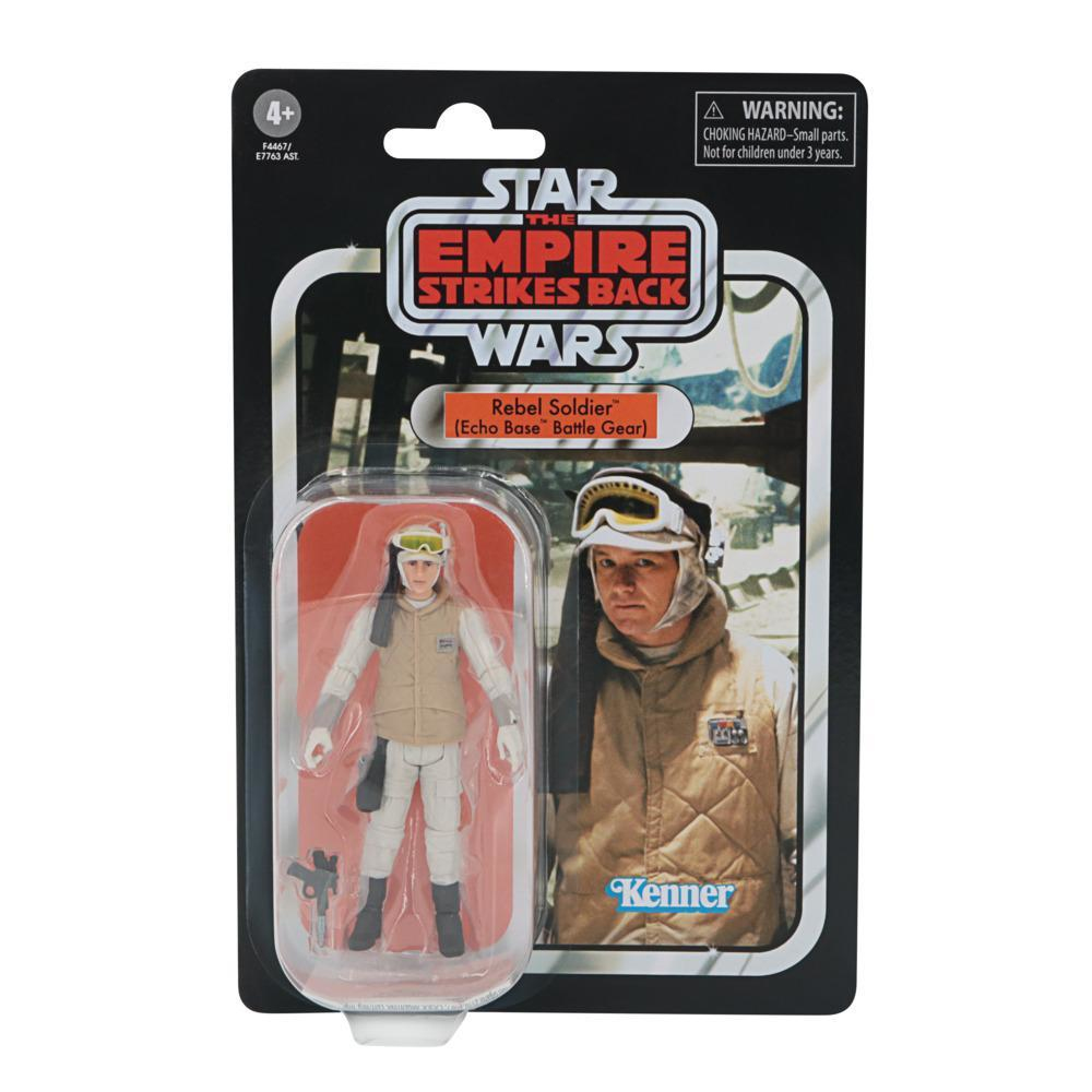 Una action figure di un soldato ribelle di Star Wars in un pacchetto. Il pacchetto è nero e presenta il logo del film e un'avvertenza.