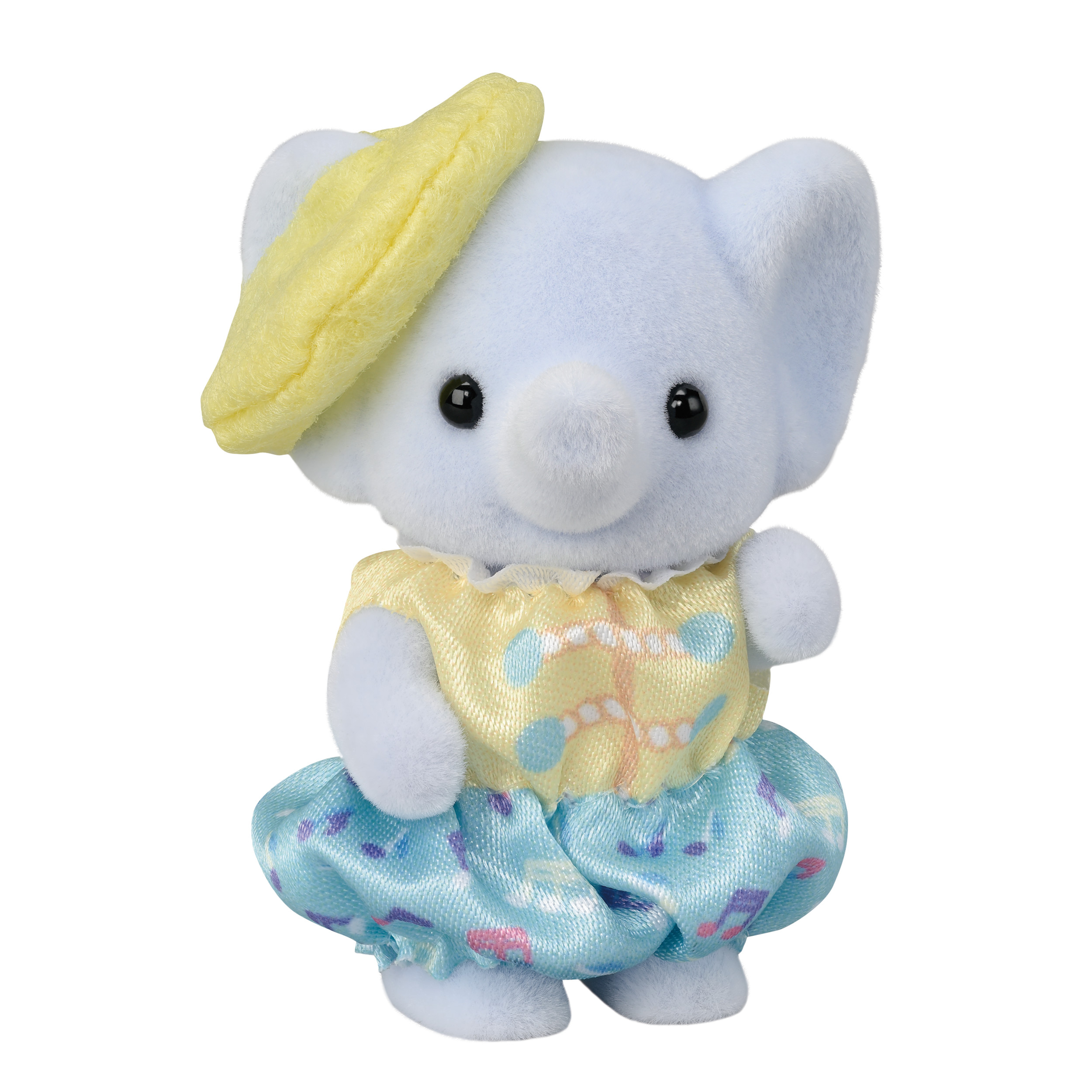 Un elefante de juguete azul con boina amarilla y vestido con top amarillo y falda azul.
