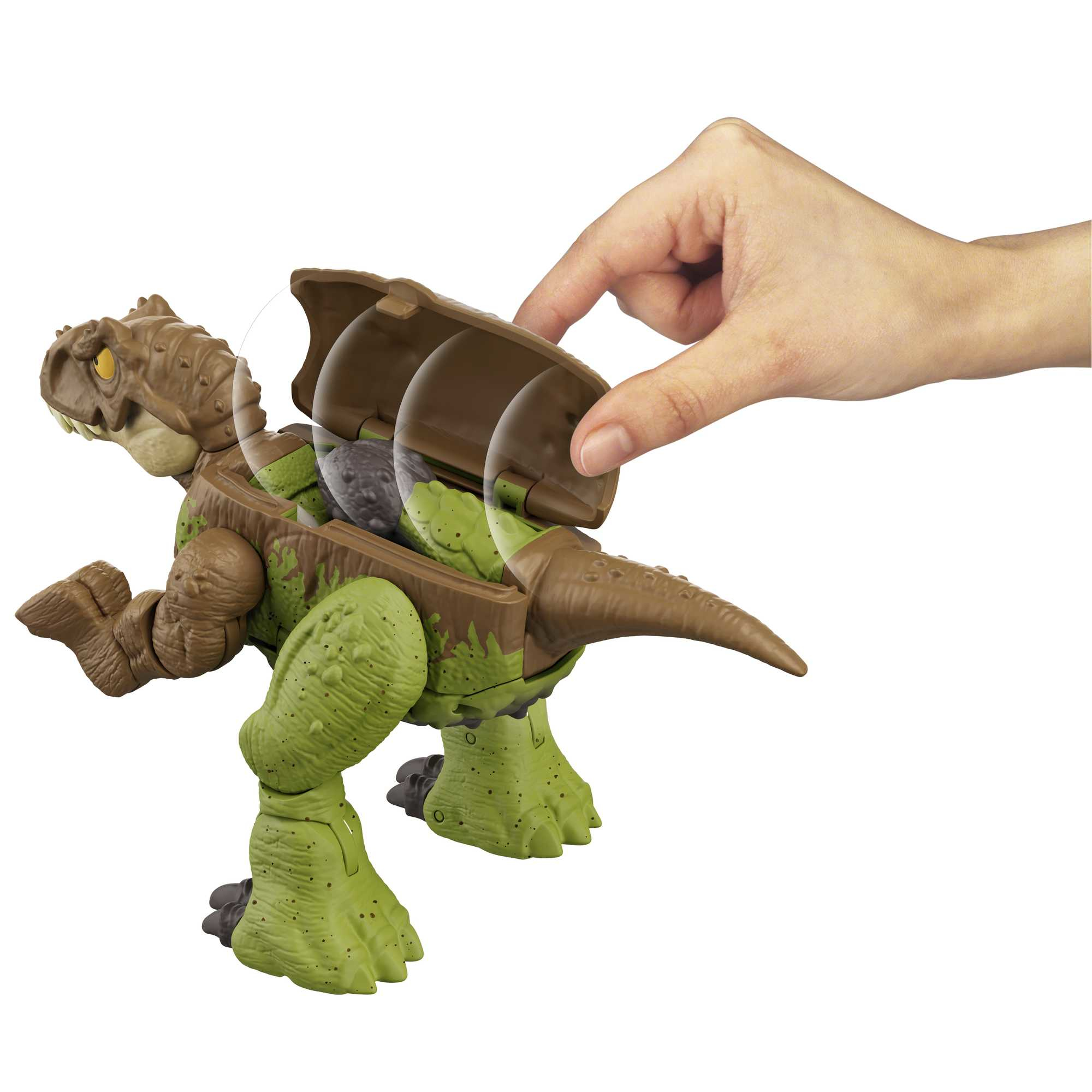 Una mano apre un giocattolo di dinosauro marrone e verde. Il giocattolo ha una schiena marrone che si apre per rivelare oggetti grigi.