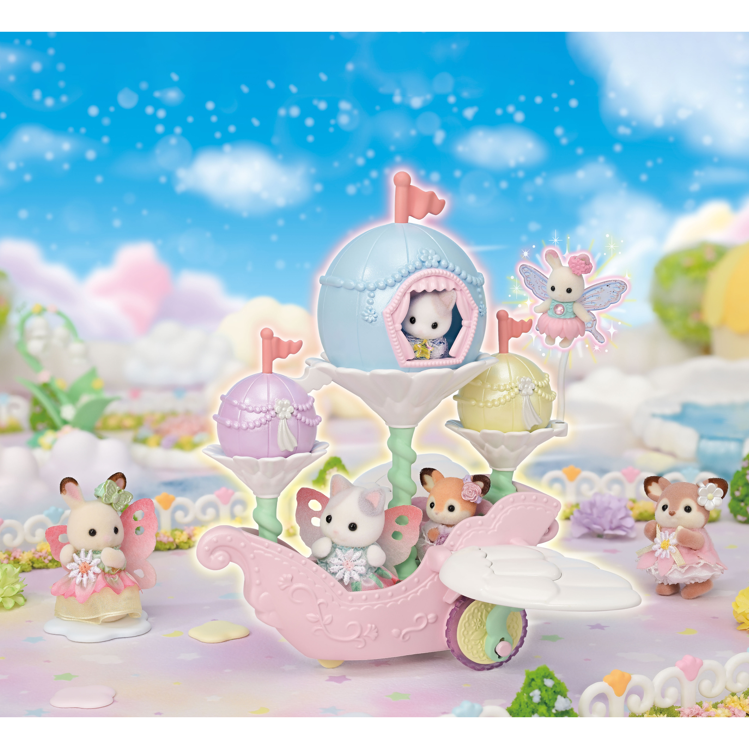 Un juego temático de hadas con figuras de animales en un paisaje pastel. Incluye un avión rosa, casas de hadas y un cielo azul.