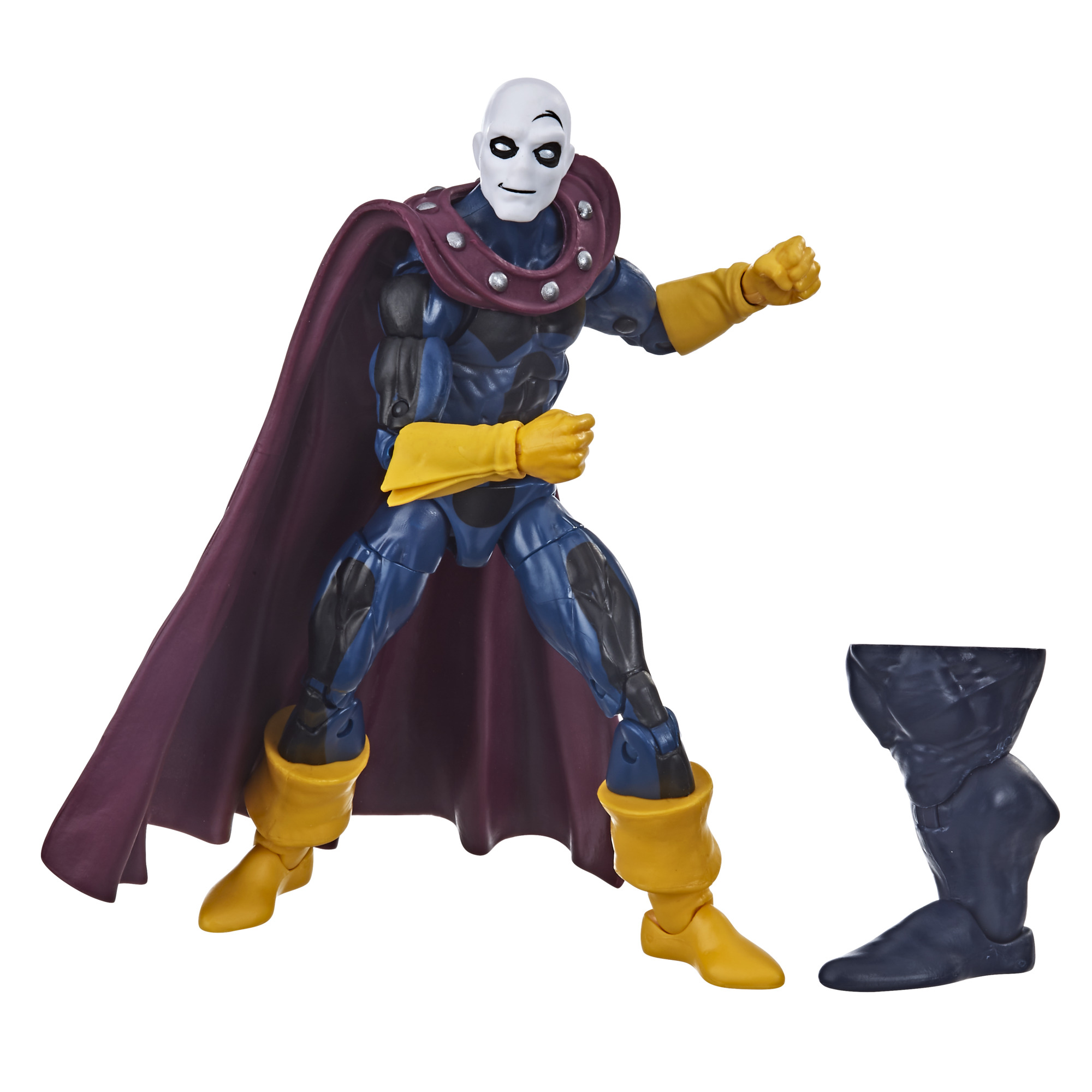 Action figure di un personaggio con volto bianco, mantello viola, guanti e stivali gialli e completo blu, in posa su sfondo bianco.