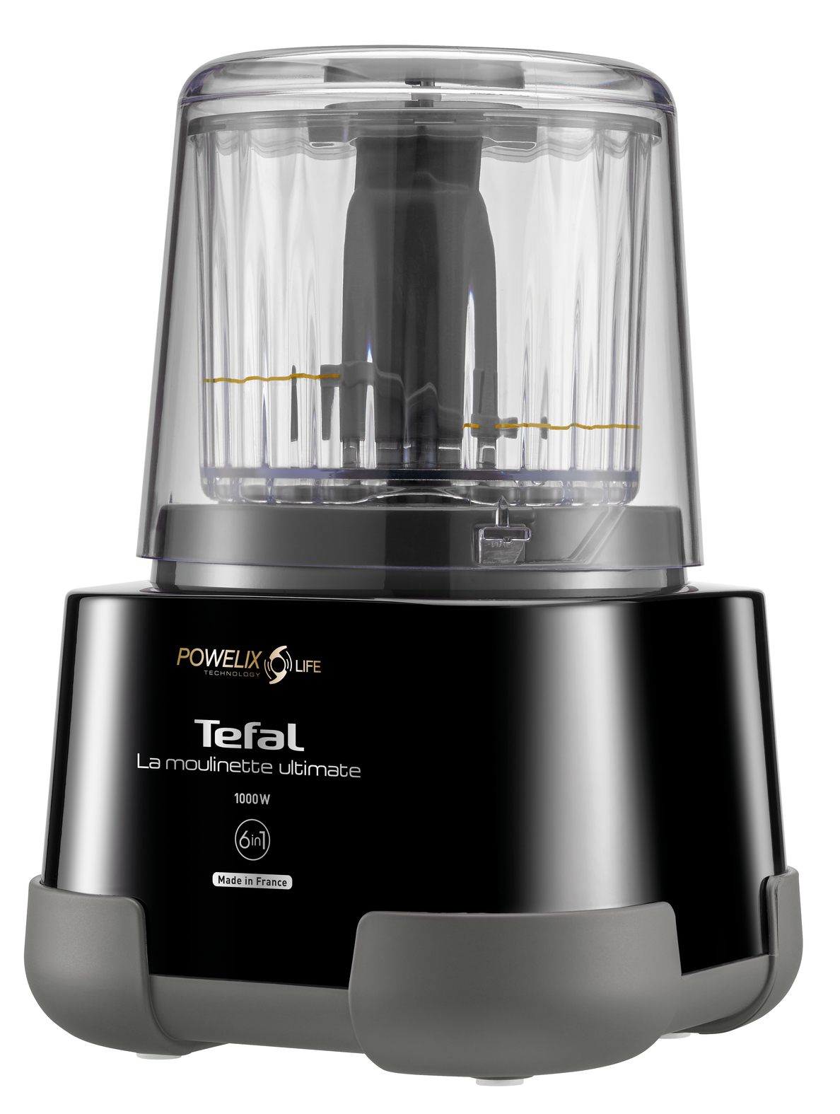 Ein Tefal La moulinette Ultimate-Küchenmaschine. Sie hat eine schwarze Basis mit einem grauen Griff und eine transparente Kunststoffoberseite.