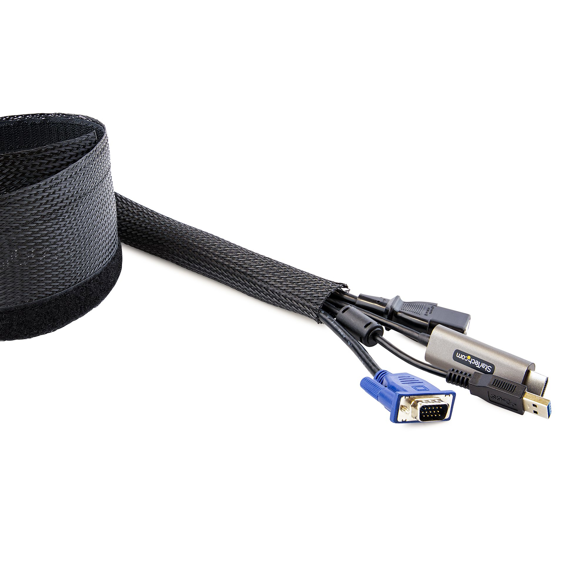 Una funda de cable negra con varios cables que salen. Los cables son negros, plateados y azules, incluyendo USB y VGA.