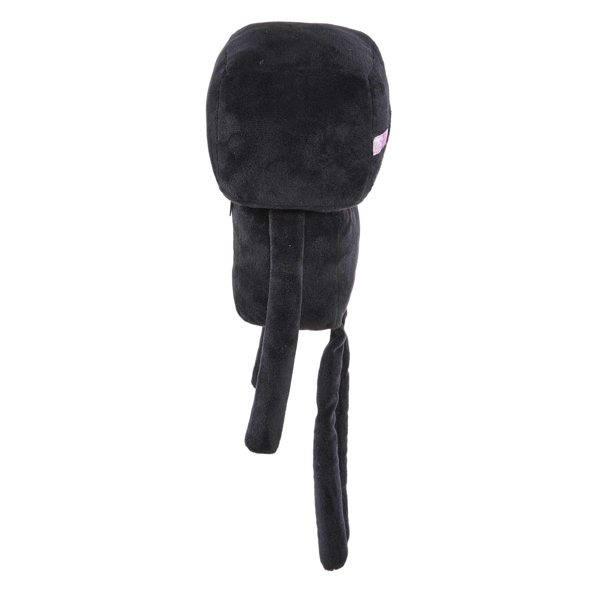 Ein schwarzes Plüschtier, das einem Minecraft-Enderman ähnelt. Es hat einen quadratischen Kopf, lange Beine und ein kleines pinkes Auge.