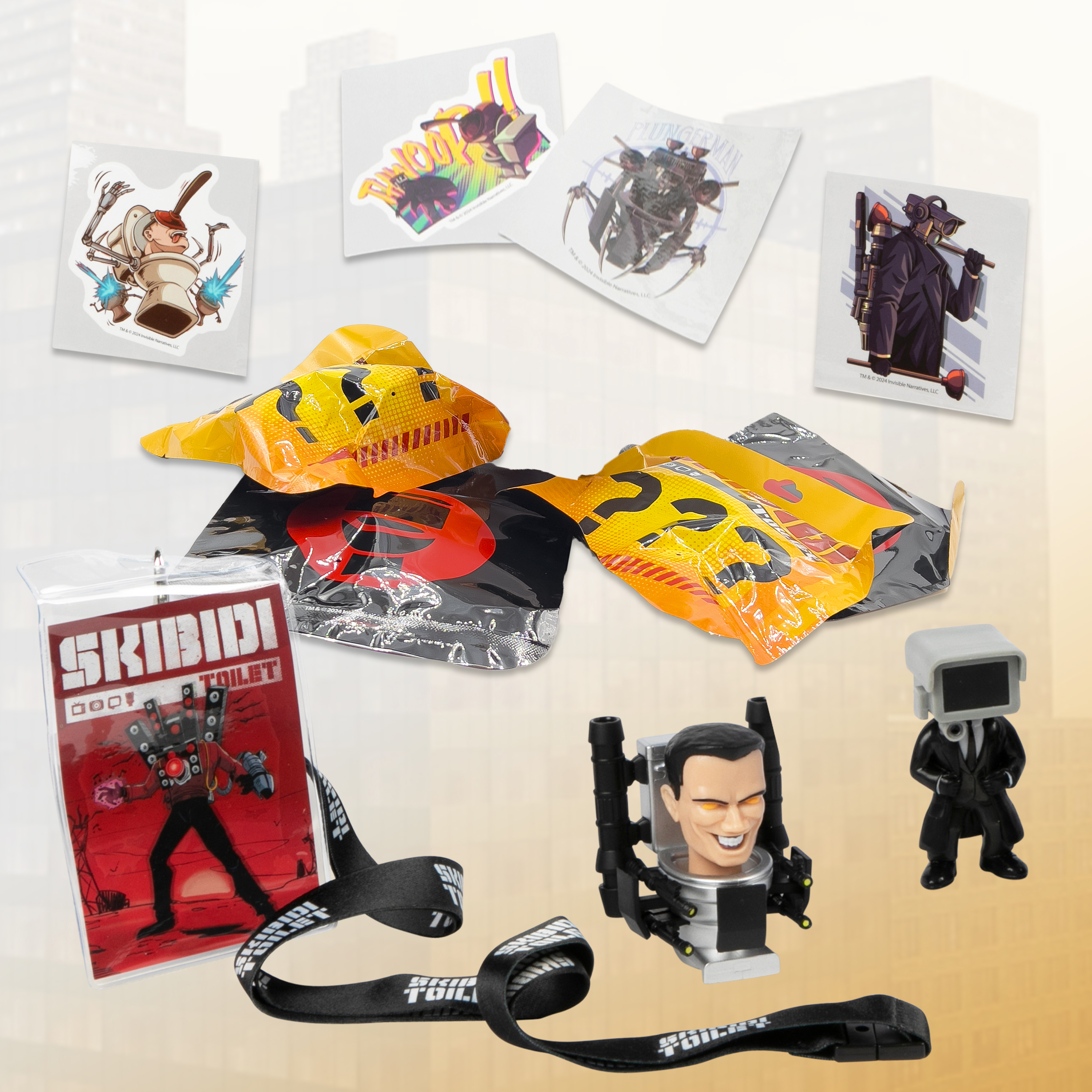 Das Bild zeigt Merchandise: Aufkleber, Blind Bags, ein Schlüsselband und Figuren, alle mit dem Thema Skibidi Toilet.