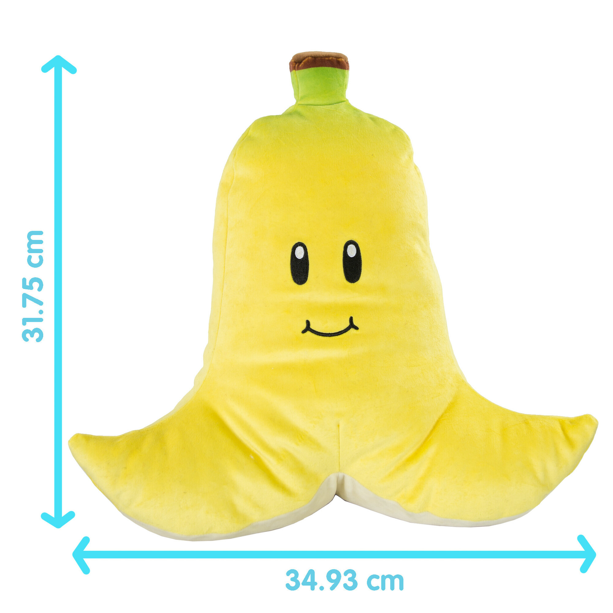 Un oreiller en peluche jaune en forme de banane avec un visage, sur fond blanc. Des mesures de 31,75 cm x 34,93 cm sont affichées.