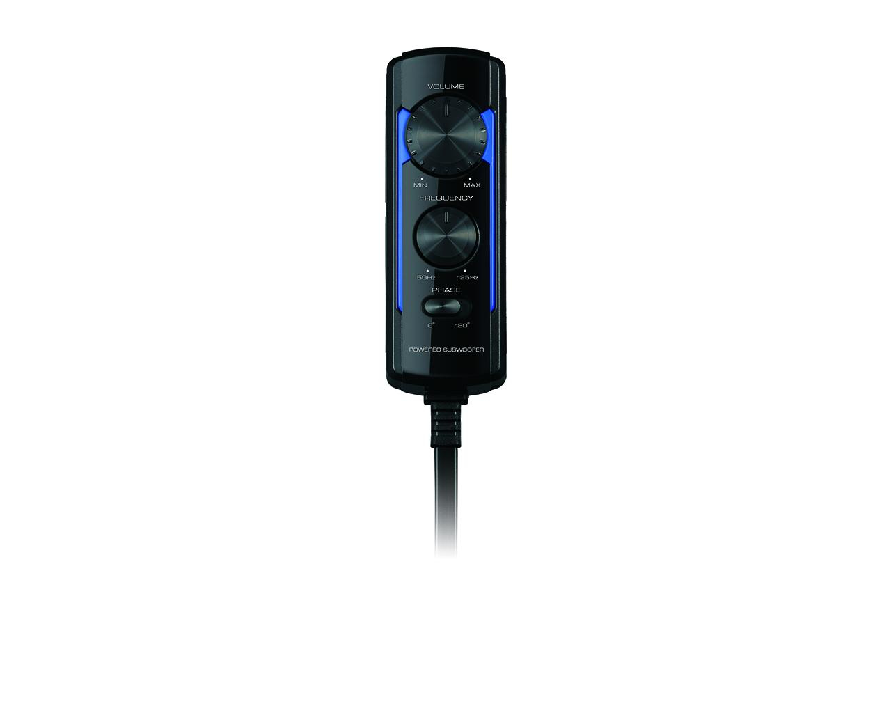 Controlador de audio negro con diales para volumen, frecuencia y fase. Etiquetado 'Powered Subwoofer'. Un cable negro se extiende hacia abajo.