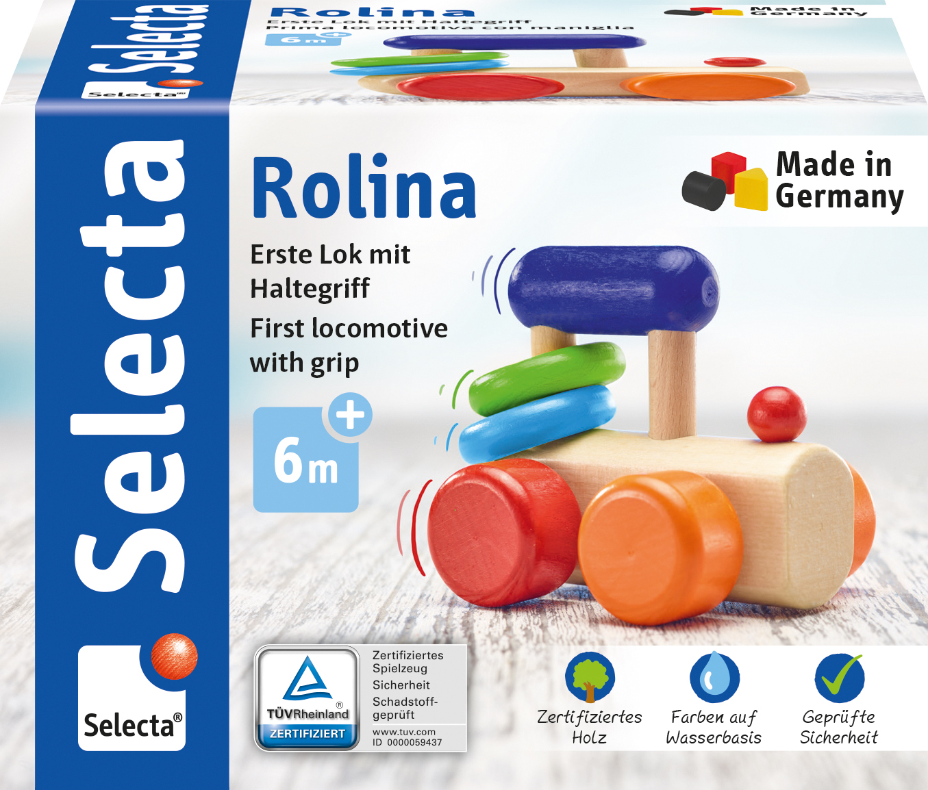 Ein Spielzeugzug mit blauen, grünen und roten Teilen auf weißem Grund. 'Made in Germany' steht drauf. Die Marke 'Selecta' ist sichtbar.