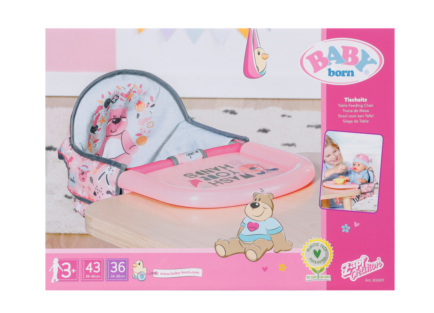 Zestaw zabawek do karmienia Baby Born. Zawiera różową tacę, zabawkę misia oraz zdjęcie dziewczynki karmiącej lalkę.