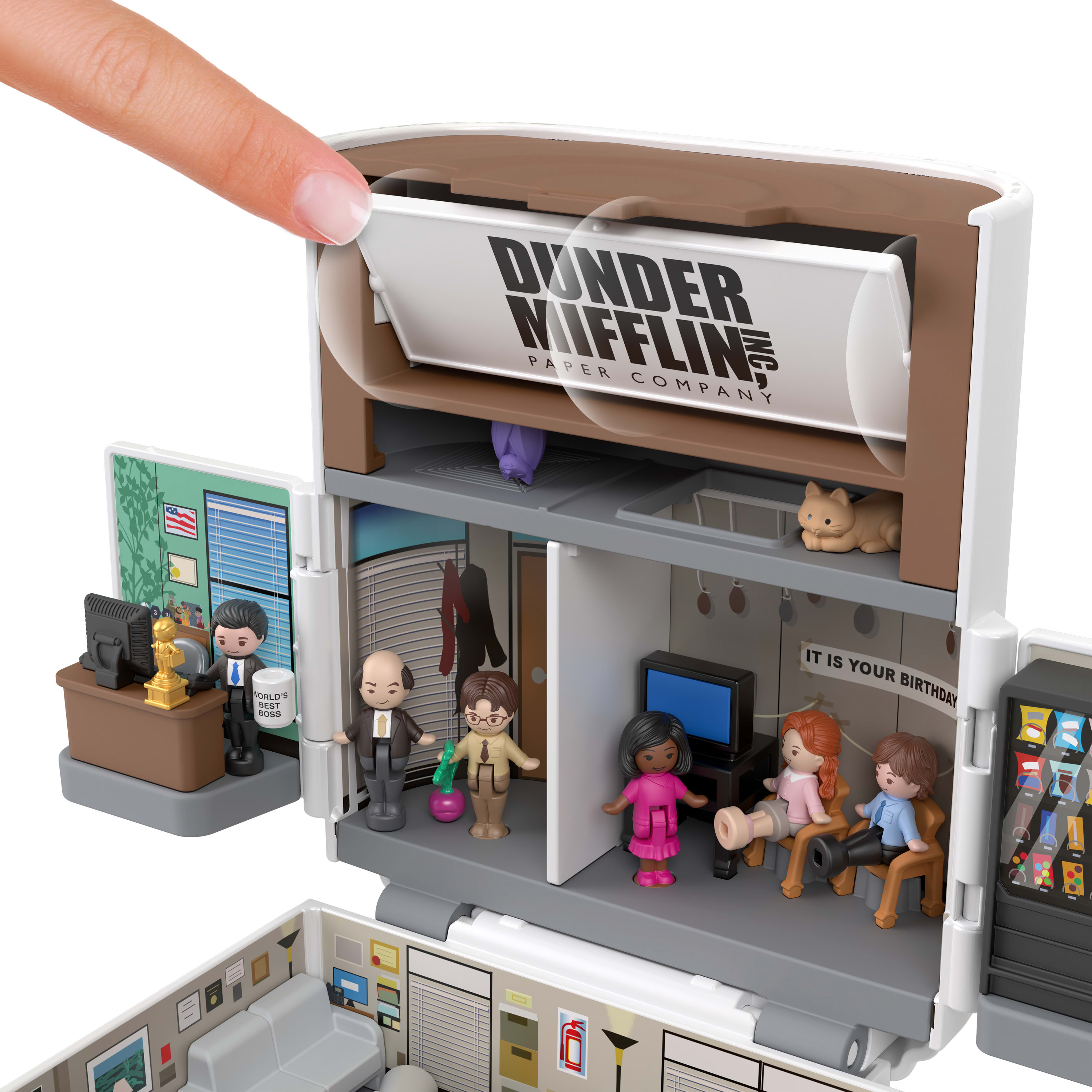 Miniaturowy zestaw biurowy Dunder Mifflin. Figurki postaci są w środku. Palec otwiera górę.