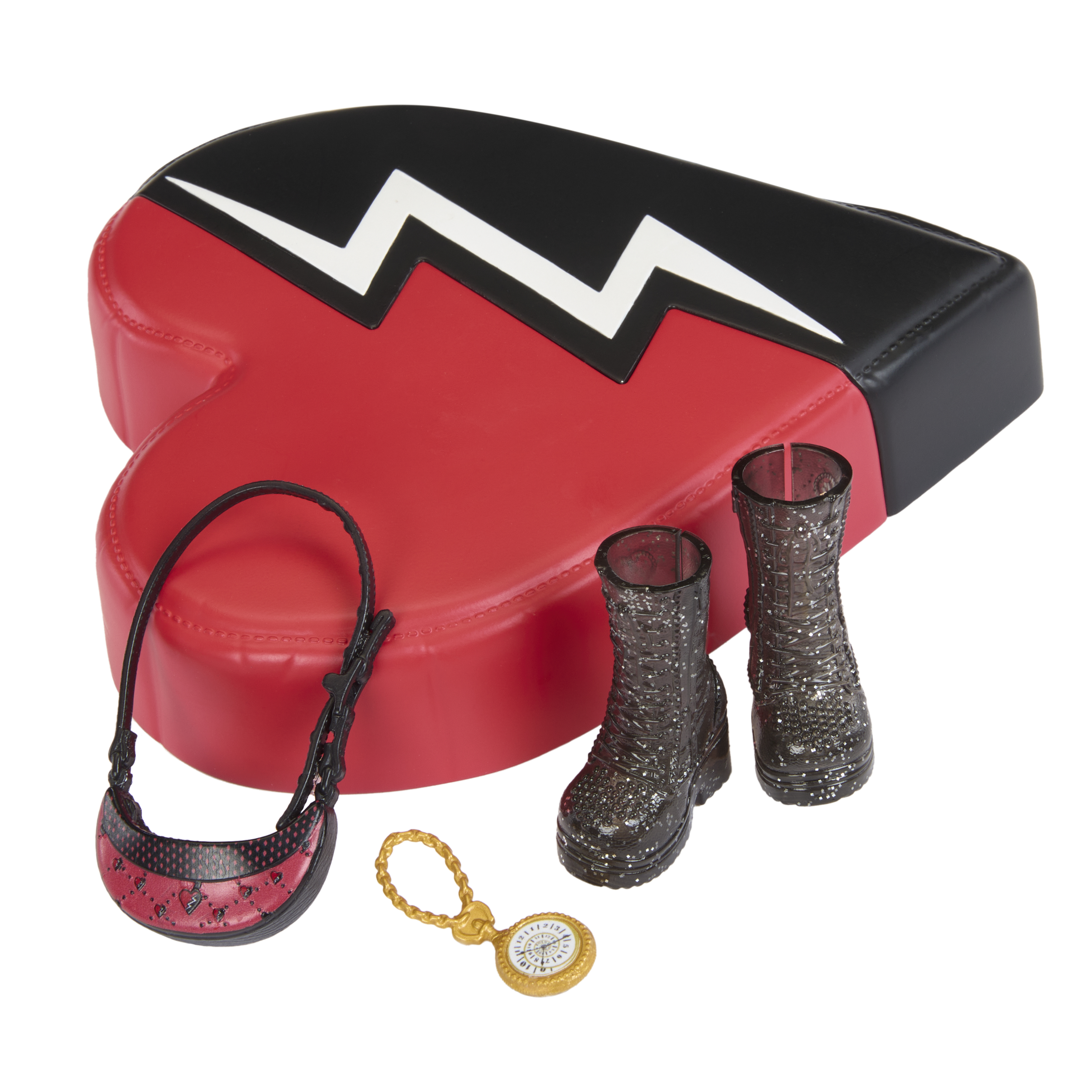 Czerwone siedzisko w kształcie serca z czarnymi akcentami. Akcesoria: torebka, buty i złoty zegarek.