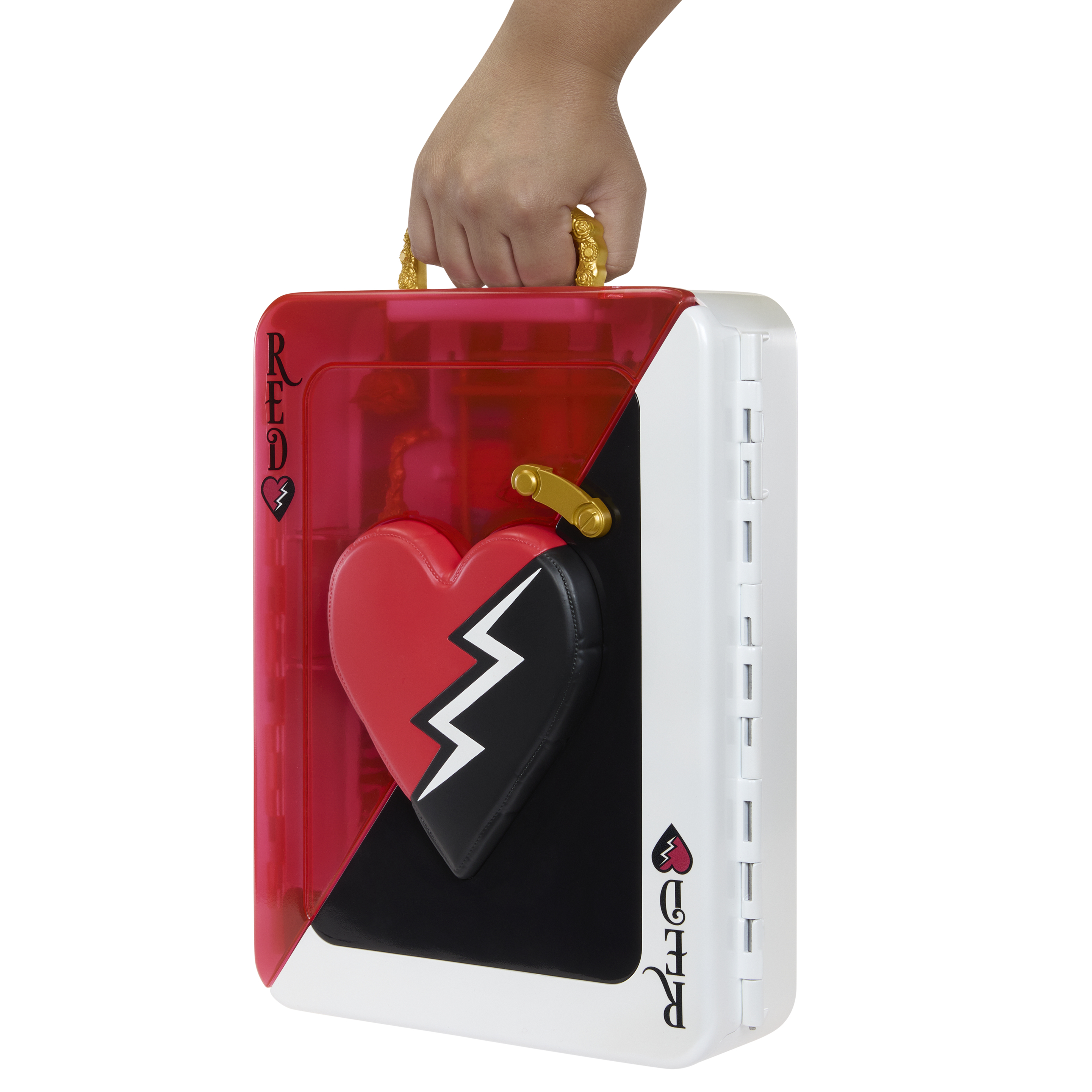 Ręka trzyma czerwoną, białą i czarną walizkę z motywem złamanego serca. Widoczne są złote uchwyty i słowo CZERWONY.