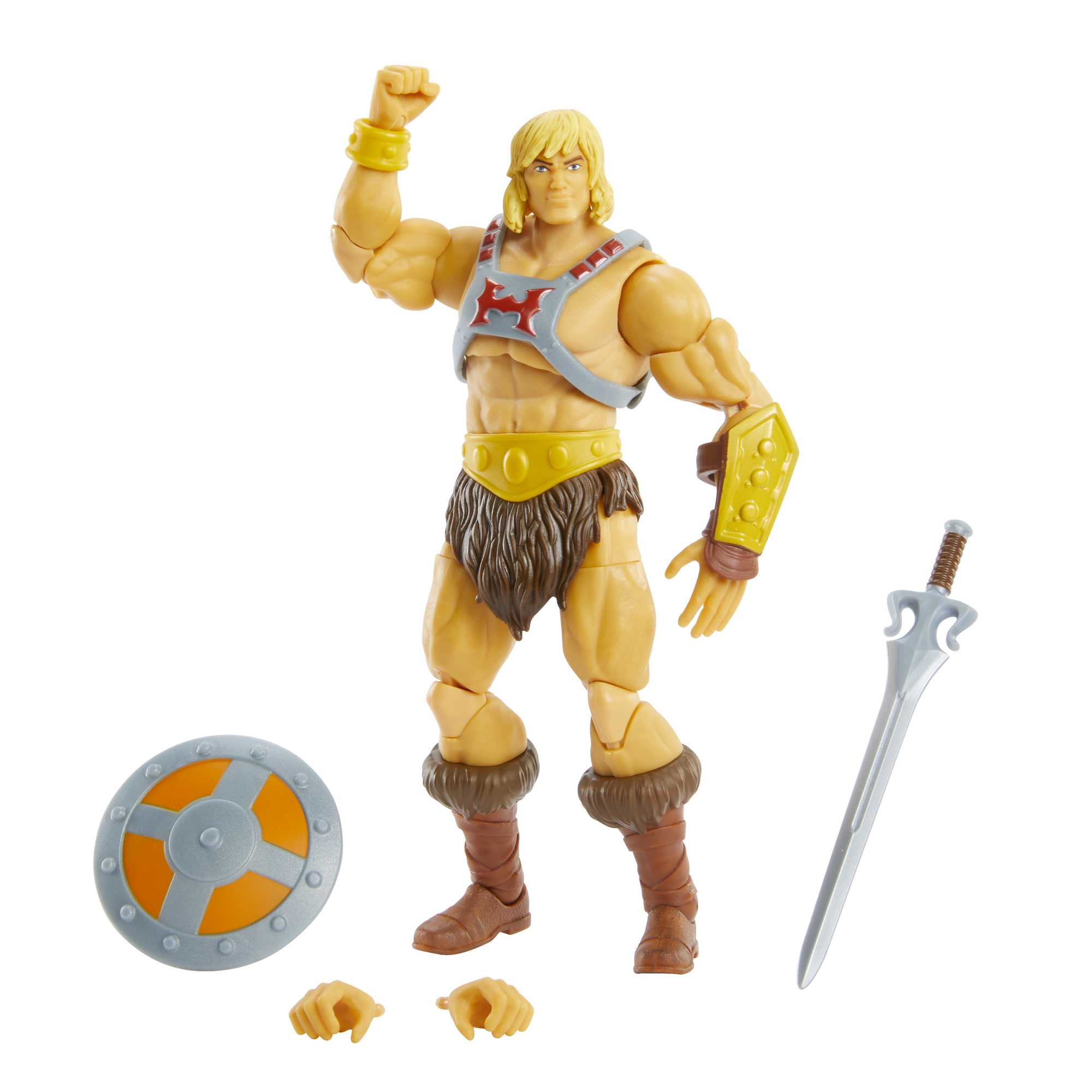 Figura de acción de He-Man en pose heroica. Incluye espada, escudo y manos adicionales. Lleva armadura, botas y taparrabos.
