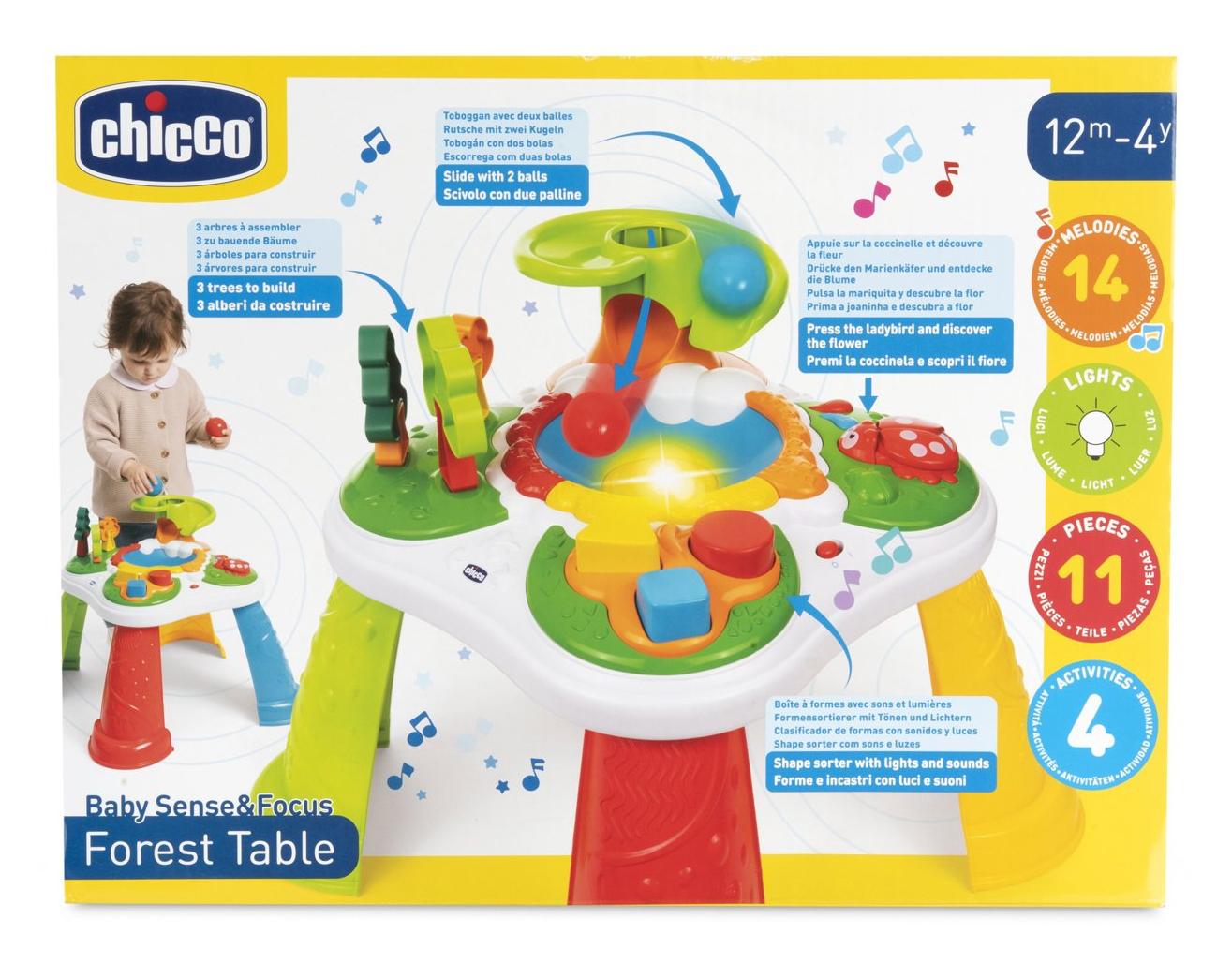 Dziecko bawi się kolorowym stolikiem. Stół ma światła, dźwięki i różne kształty do interakcji dla dziecka.